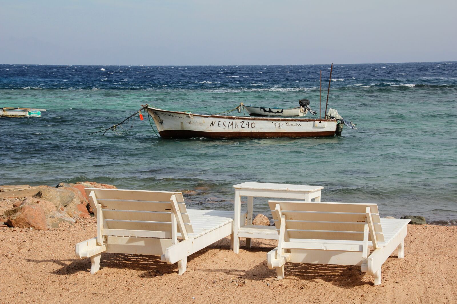 Canon EOS 60D sample photo. Concerns, beach lie, 2 photography