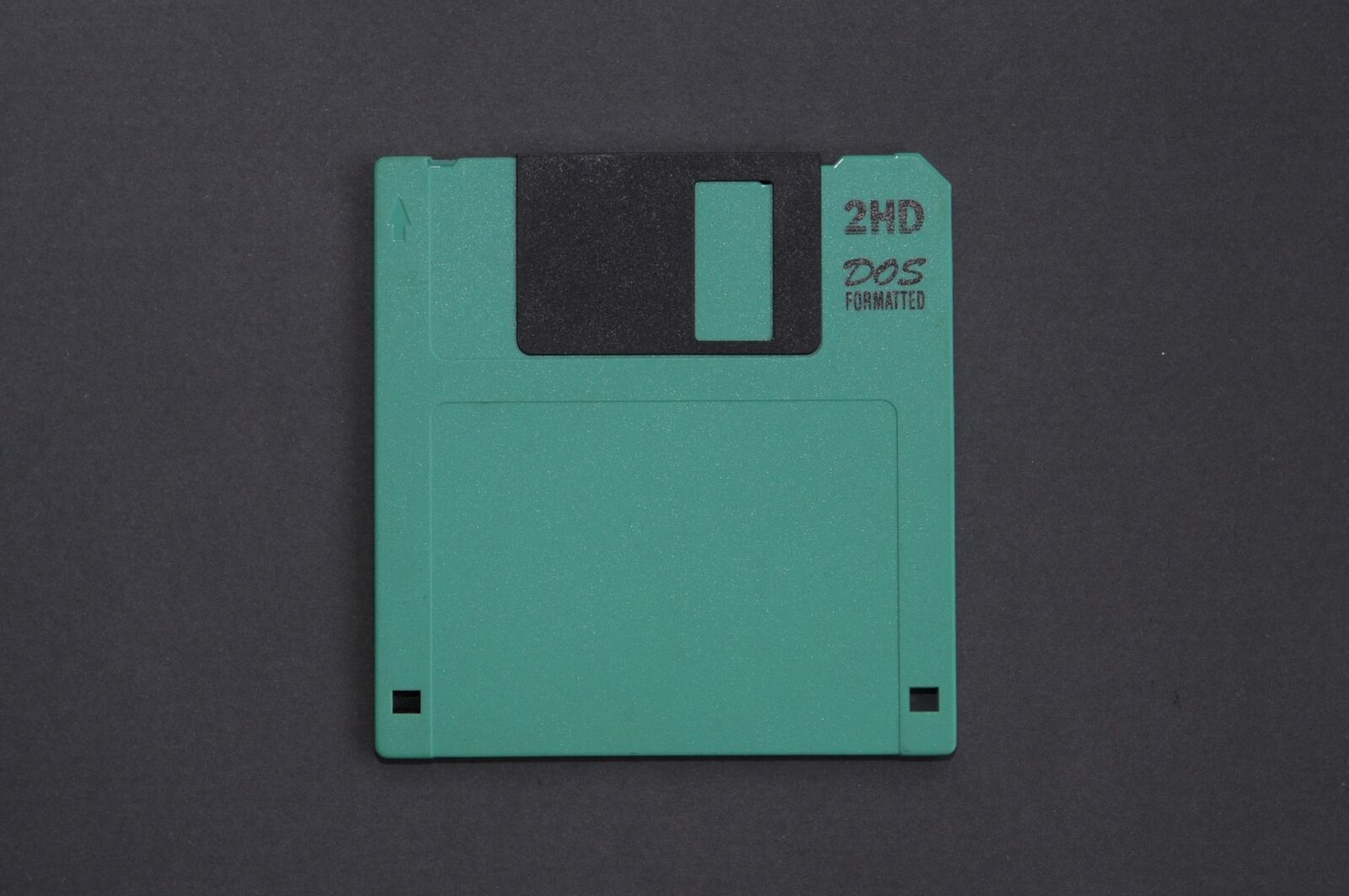 Nikon D90 sample photo. Green floppy disk, old photography