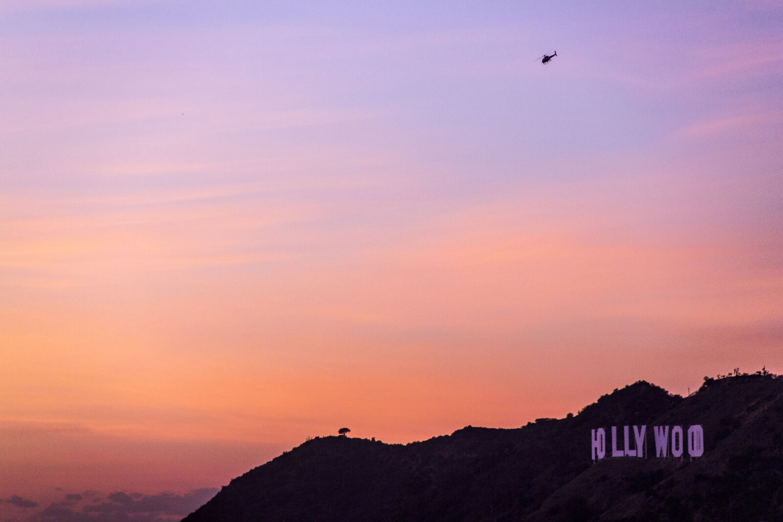 Canon EOS 550D (EOS Rebel T2i / EOS Kiss X4) sample photo. America, evening, sky, helicopter photography