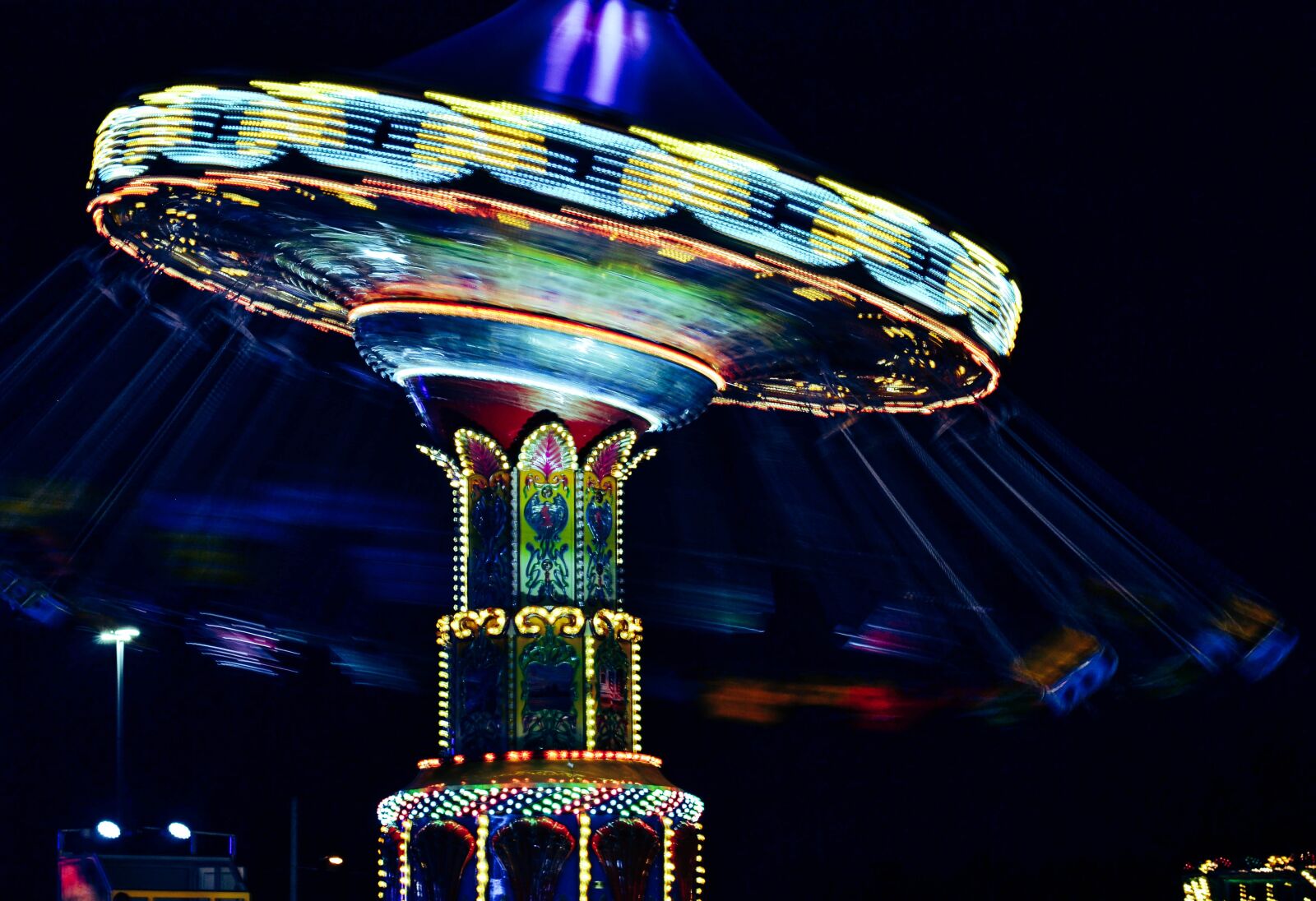 Nikon D3100 + Nikon AF-S Nikkor 50mm F1.8G sample photo. Carnival, carnival ride, swing photography