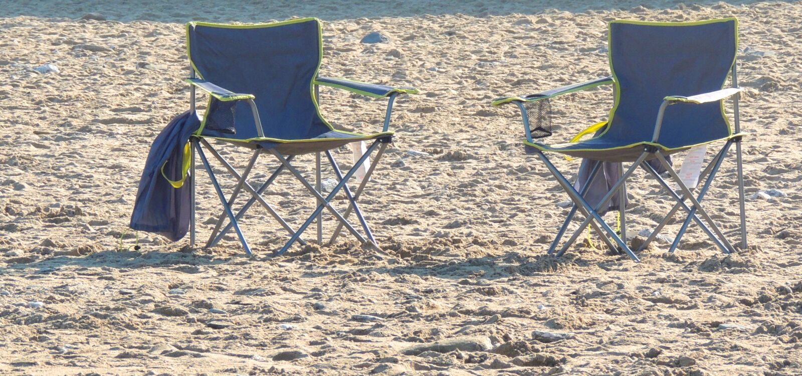 Nikon Coolpix P510 sample photo. Empty sun chairs, sand photography