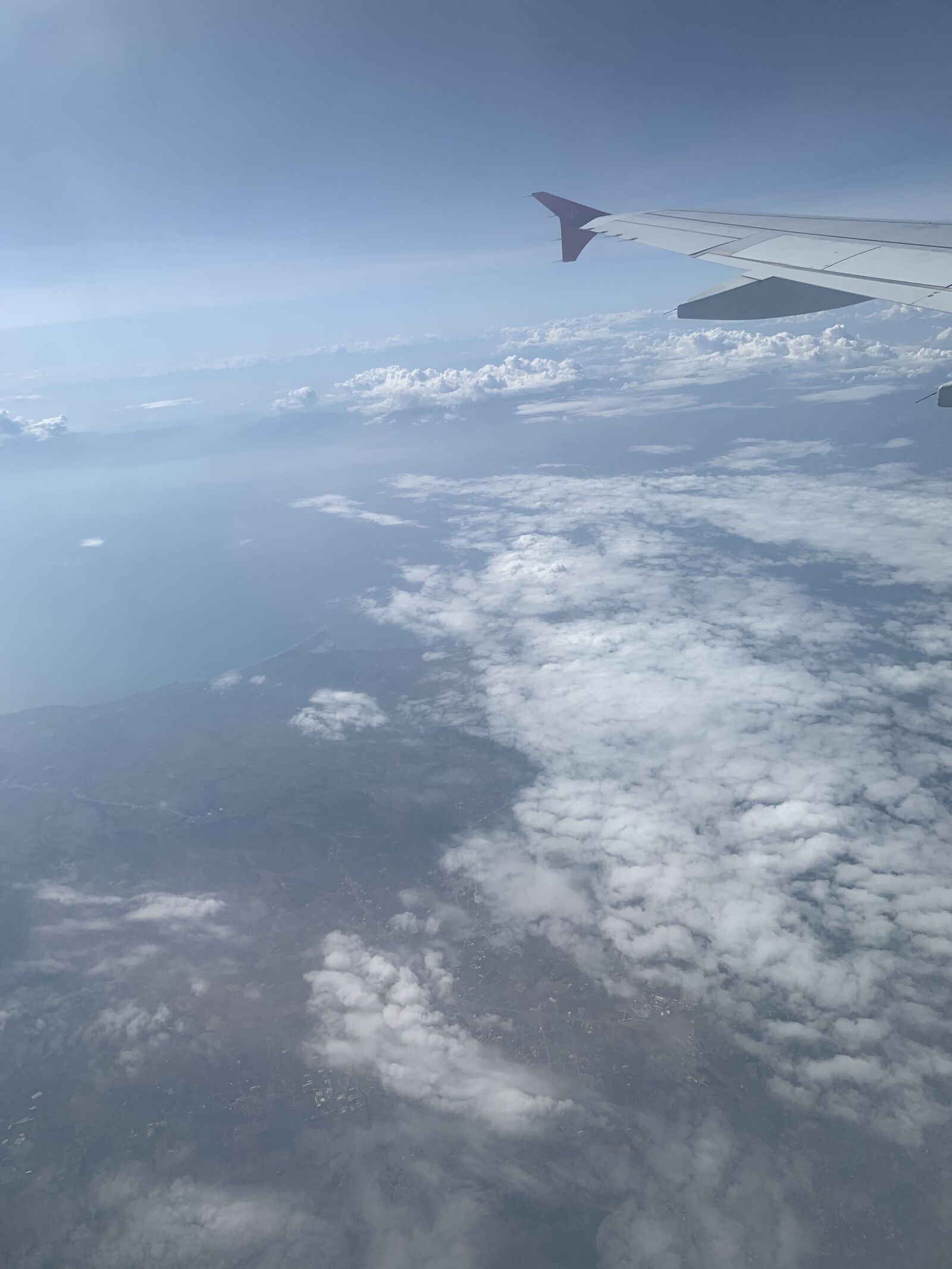 iPhone XS Max back dual camera 4.25mm f/1.8 sample photo. Mountain, aircraft, cloud photography