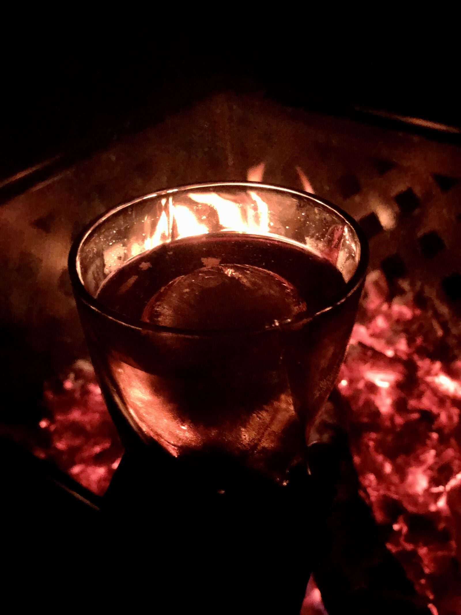 iPhone X back dual camera 6mm f/2.4 sample photo. Drink, fire, whiskey photography