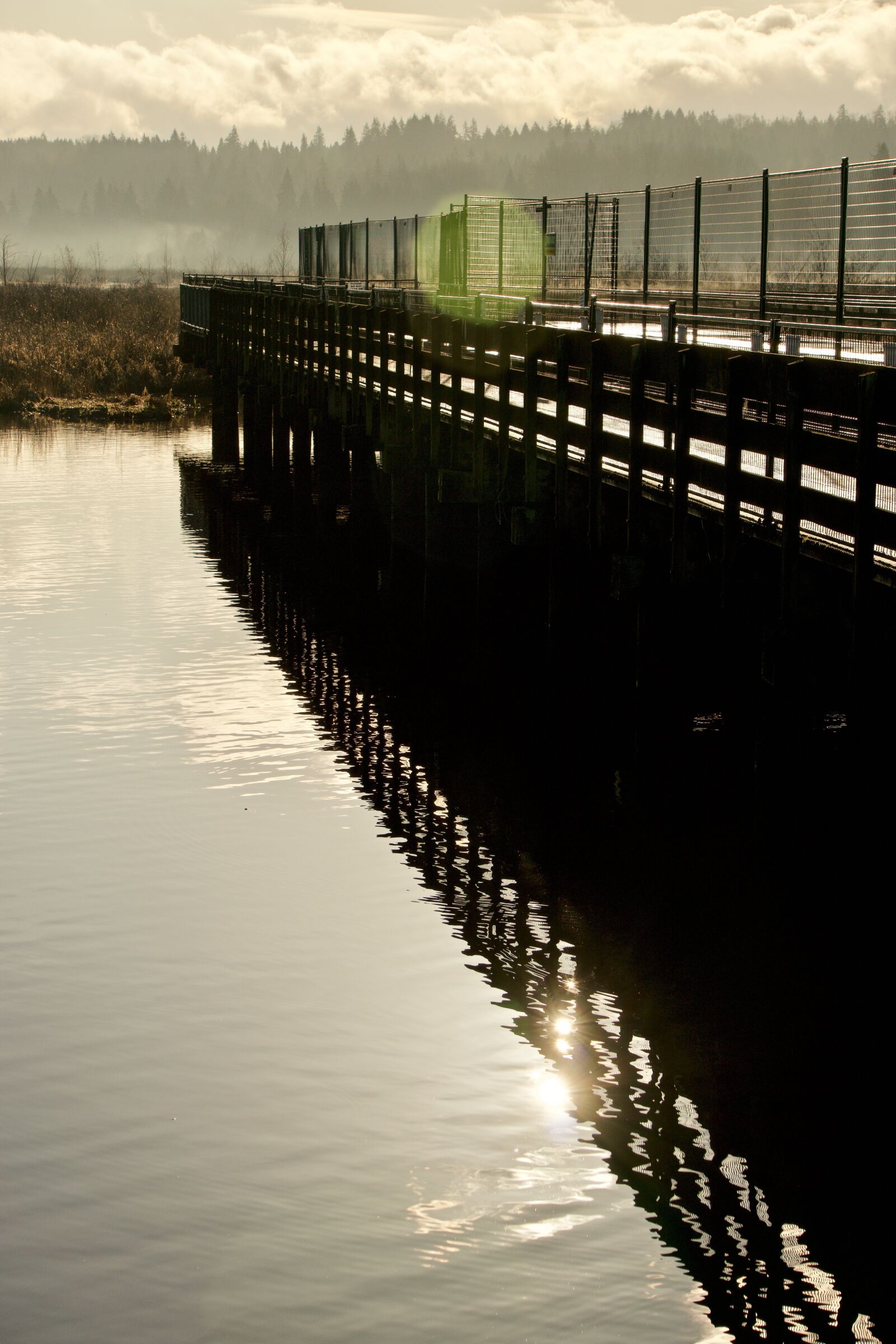 Sony E 55-210mm F4.5-6.3 OSS sample photo. Lake, deck, pier photography