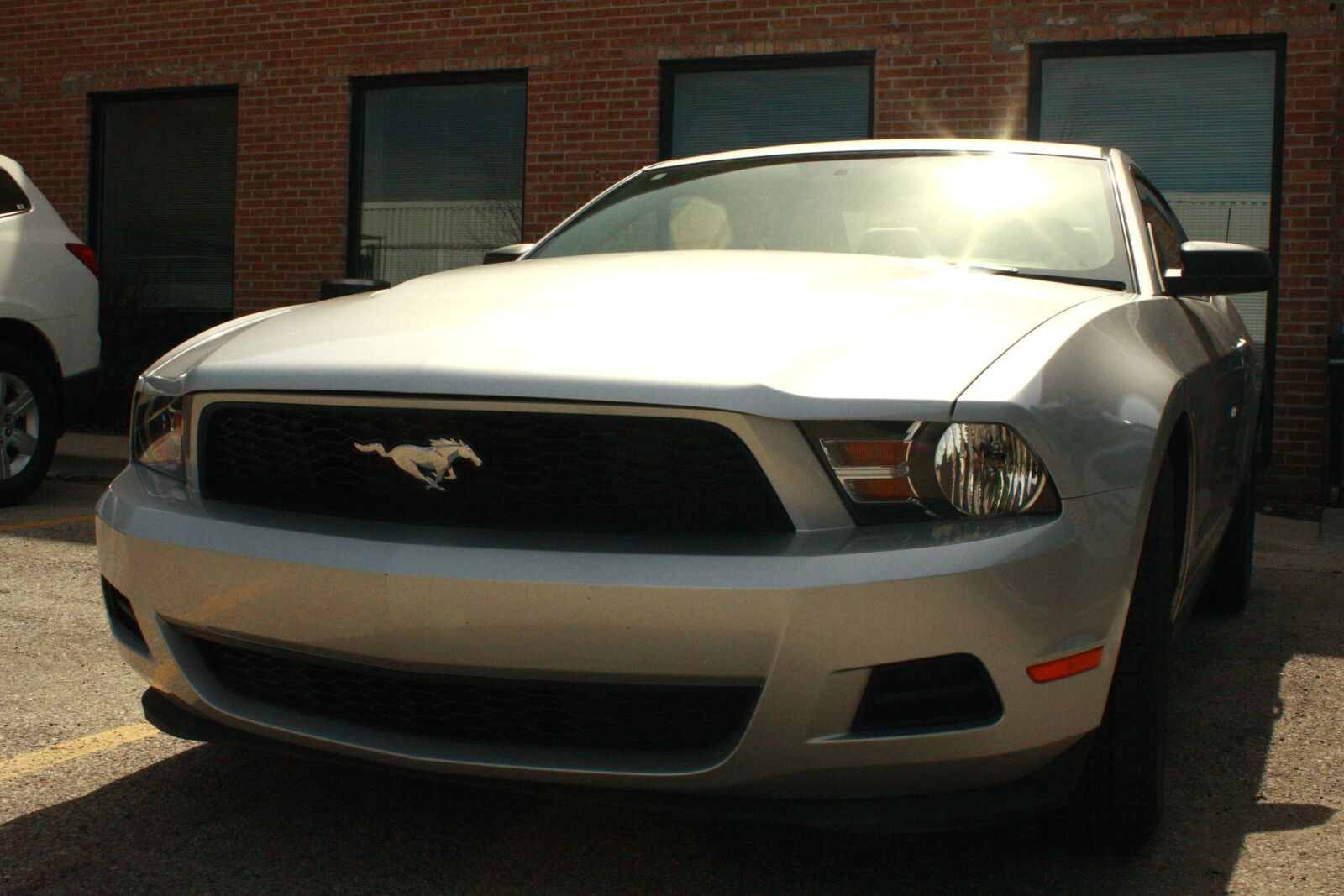 Canon EOS 1000D (EOS Digital Rebel XS / EOS Kiss F) sample photo. Sport car, headlight, car photography