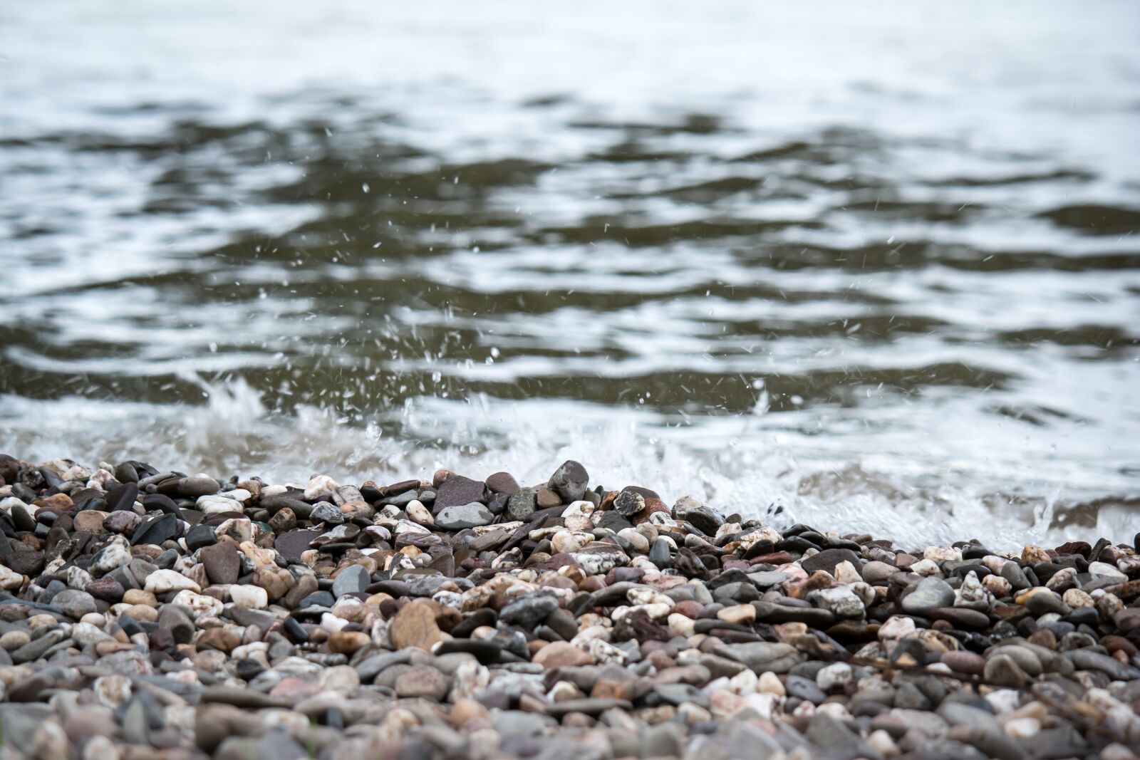 Samsung NX 50-200mm F4-5.6 ED OIS sample photo. Pebble, beach, stones photography