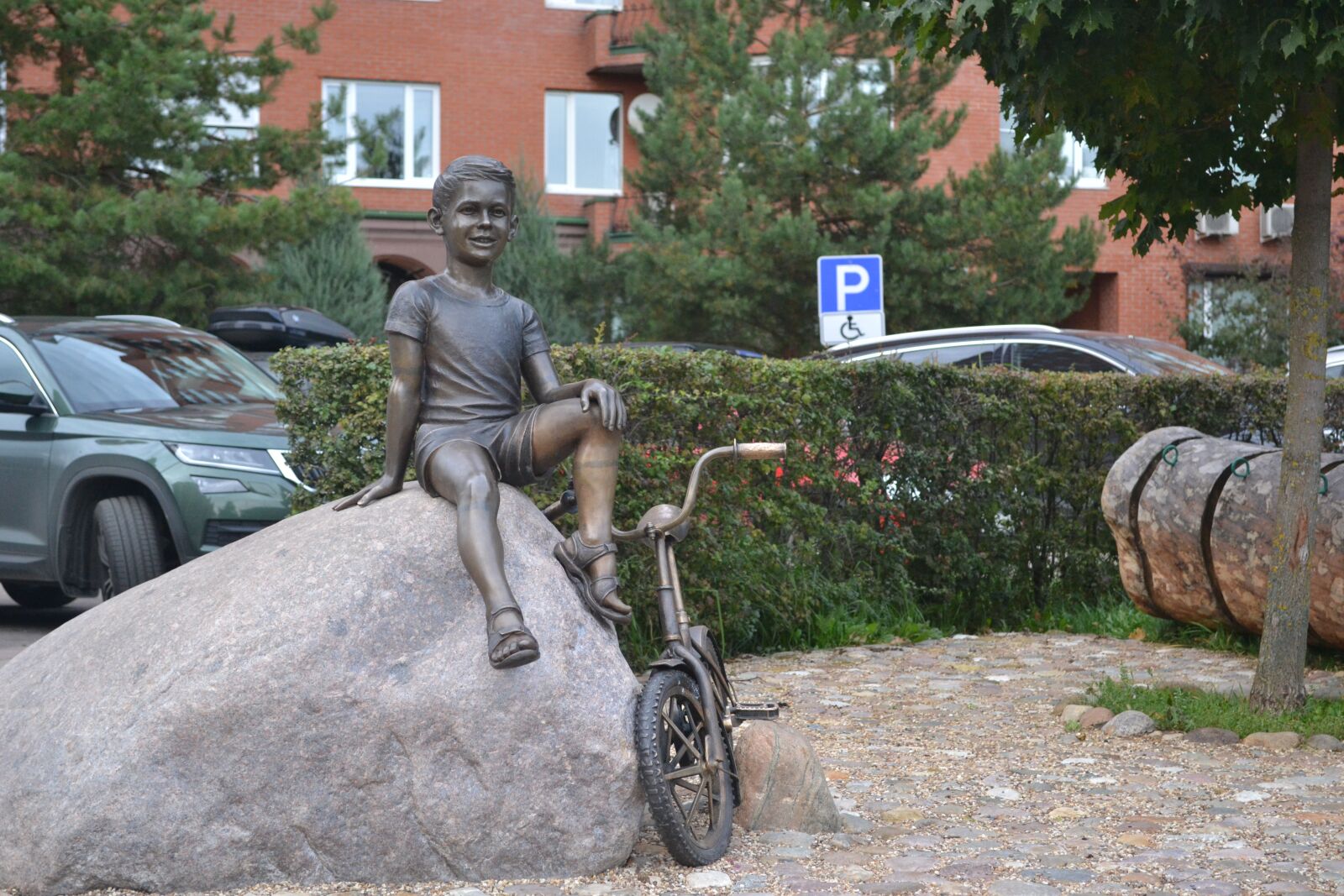 Nikon D3100 sample photo. Sculpture, boy, bike photography