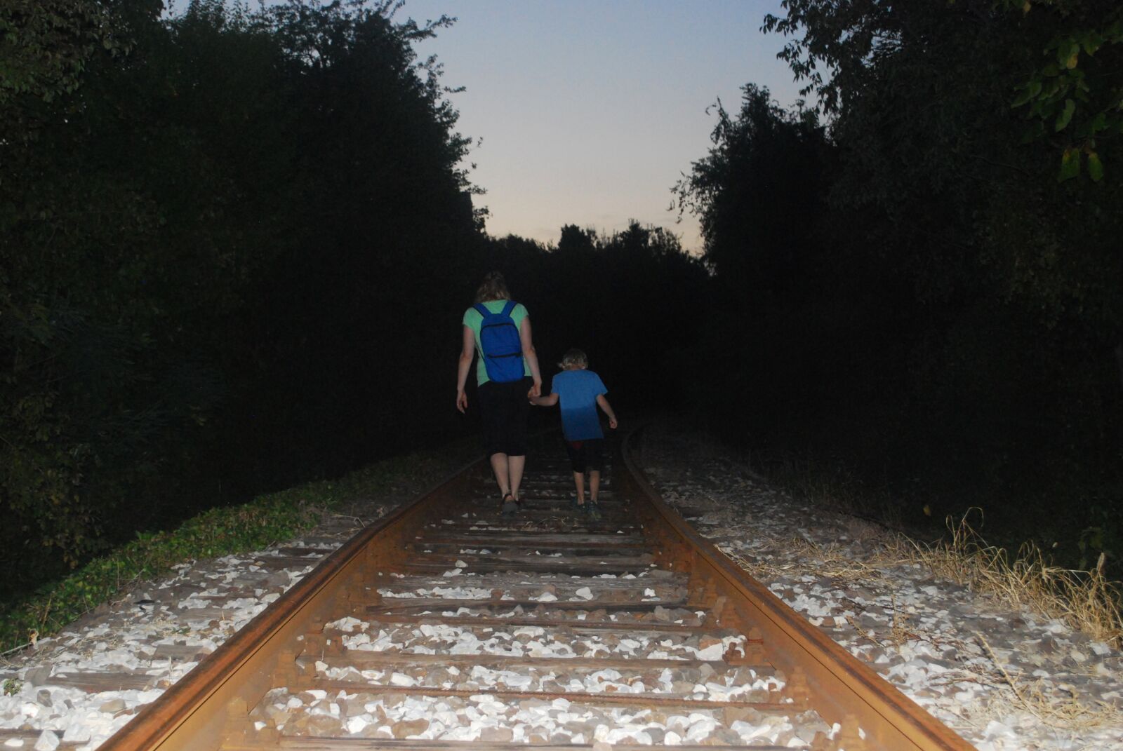 Nikon D60 sample photo. Dark, walking, railway photography