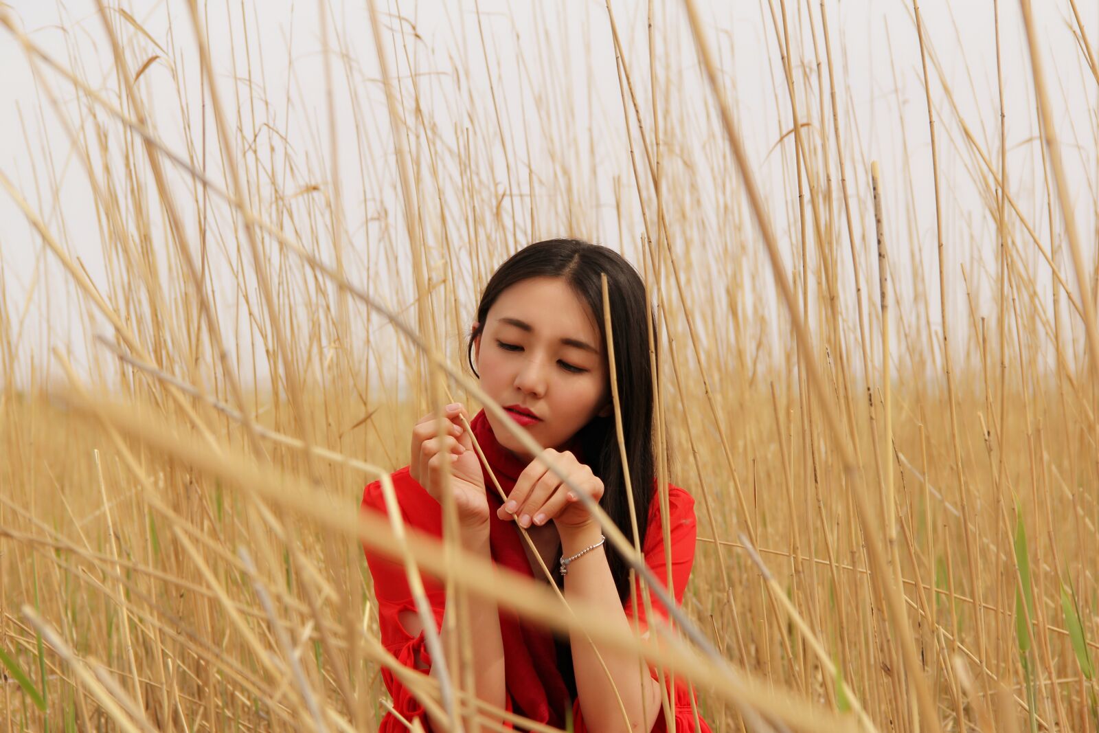 Canon EF-S 18-135mm F3.5-5.6 IS sample photo. Girls, reed, red corset photography
