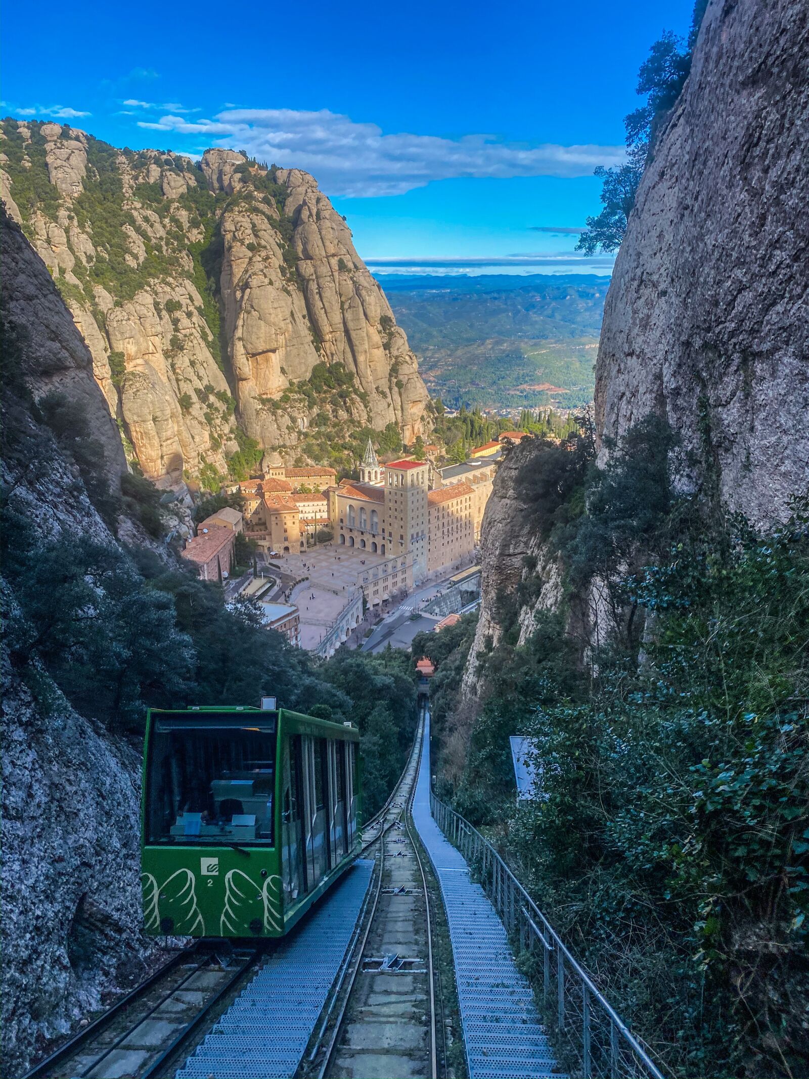 iPhone 11 Pro back triple camera 4.25mm f/1.8 sample photo. Barcelona, monastery, cable car photography