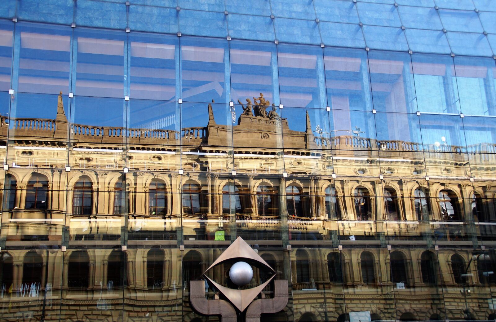 Sony SLT-A58 sample photo. Reflection, glass, building photography