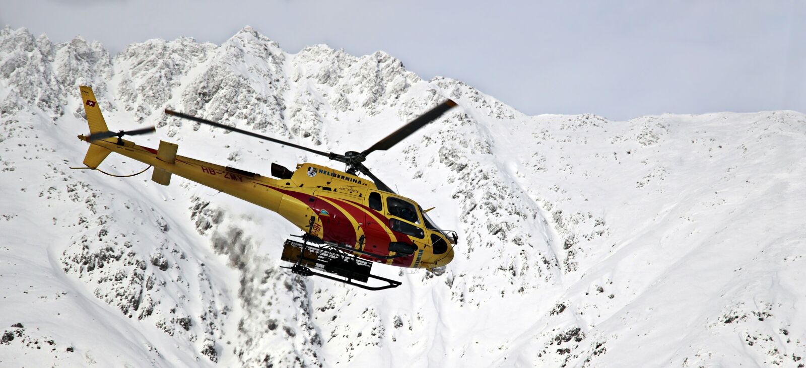 Canon EOS 100D (EOS Rebel SL1 / EOS Kiss X7) sample photo. Helicopter, mountains, snow photography
