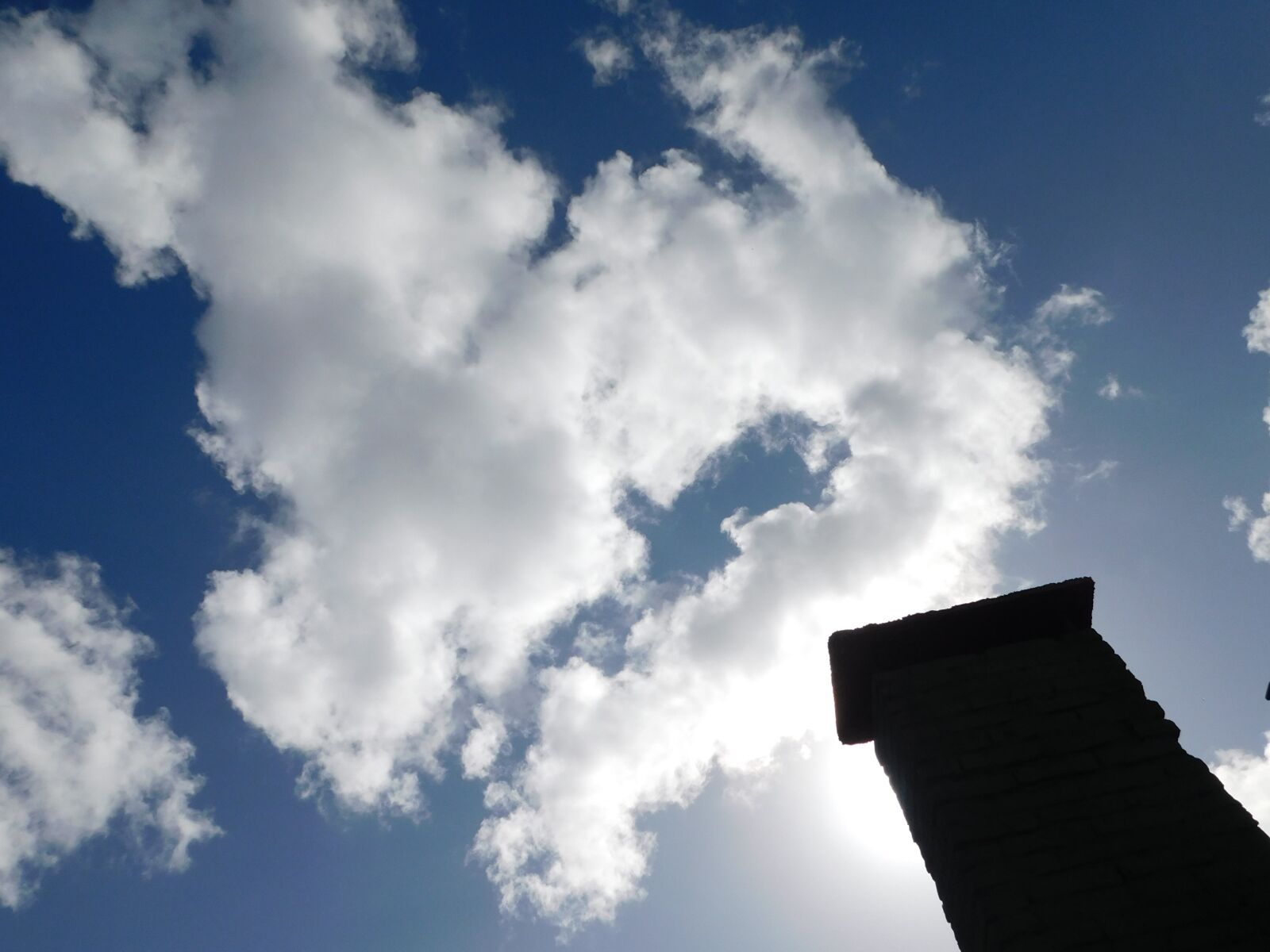 Nikon Coolpix B500 sample photo. Fireplace, sky, clouds photography