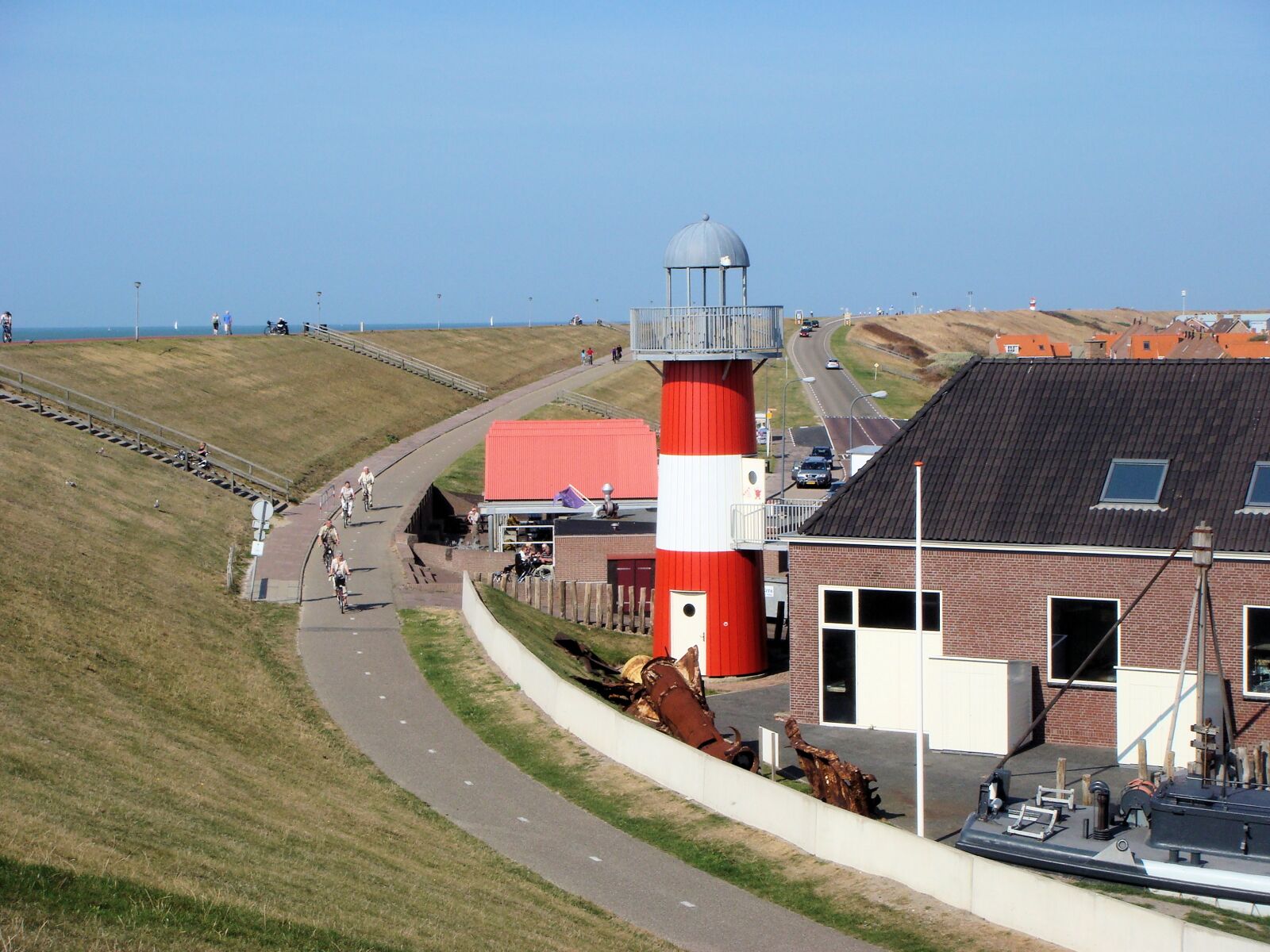 Sony DSC-T100 sample photo. Lighthouse, netherlands, coast photography