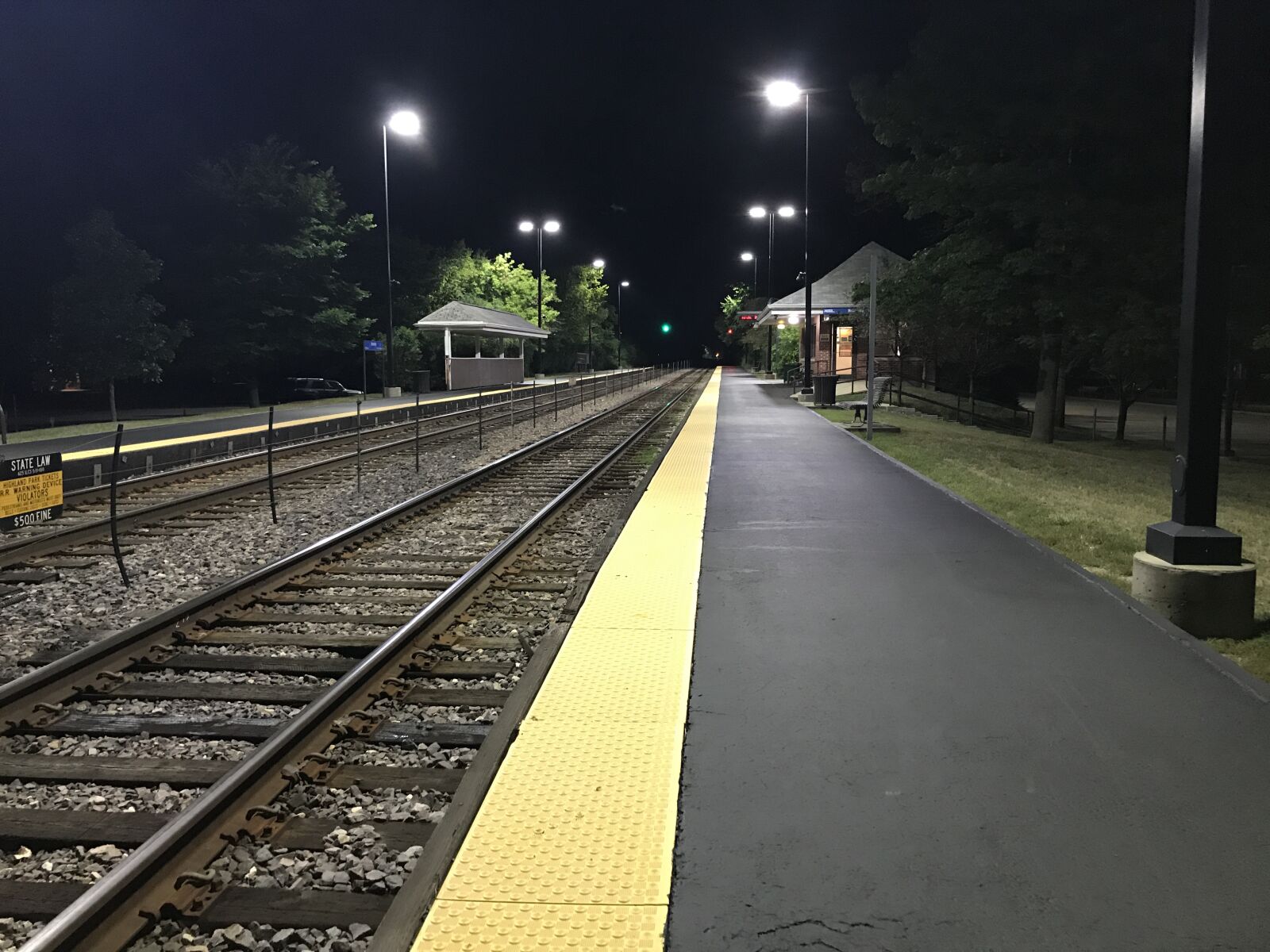 iPhone 7 Plus back dual camera 3.99mm f/1.8 sample photo. Train station, desolate, midnight photography