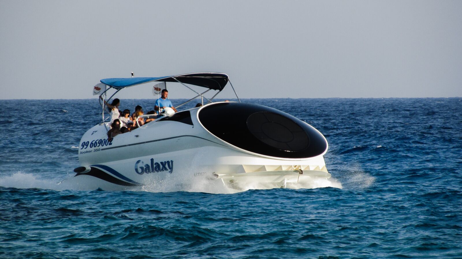 Canon PowerShot SX400 IS sample photo. Speed boat, cruise boat photography