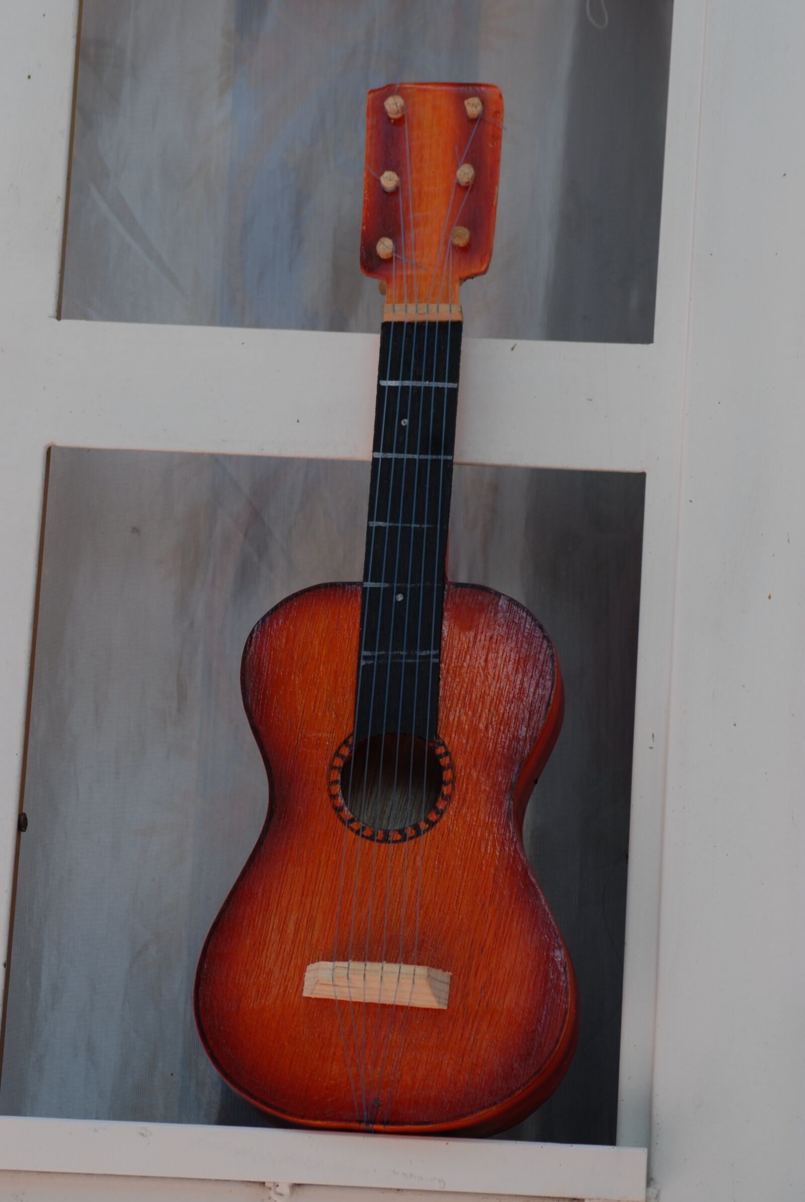 Nikon D200 sample photo. Guitar, toy, ropes photography