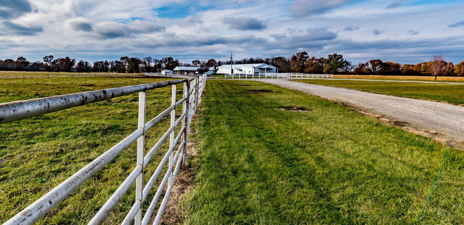Tamron SP 15-30mm F2.8 Di VC USD sample photo. Horse stable, fence, pipe photography