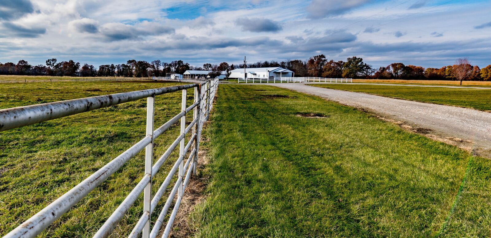 Nikon D810 + Tamron SP 15-30mm F2.8 Di VC USD sample photo. Horse stable, fence, pipe photography