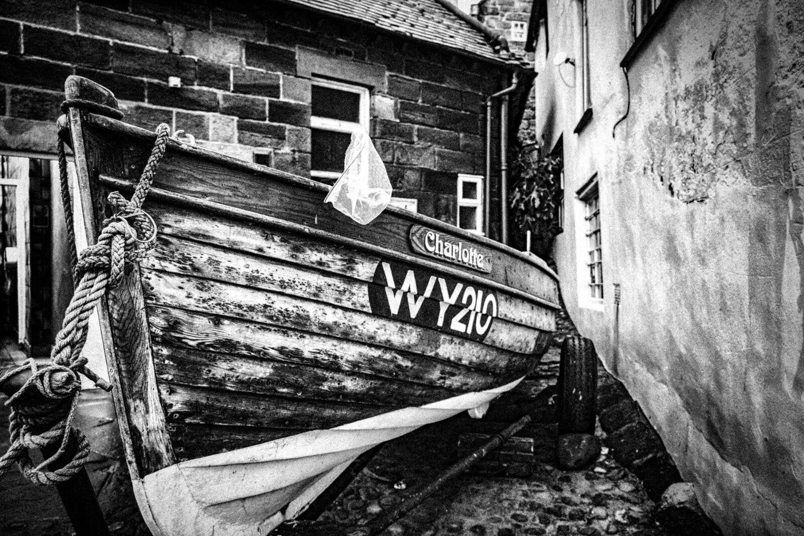 Fujifilm XF 18-55mm F2.8-4 R LM OIS sample photo. Black and white, boat photography