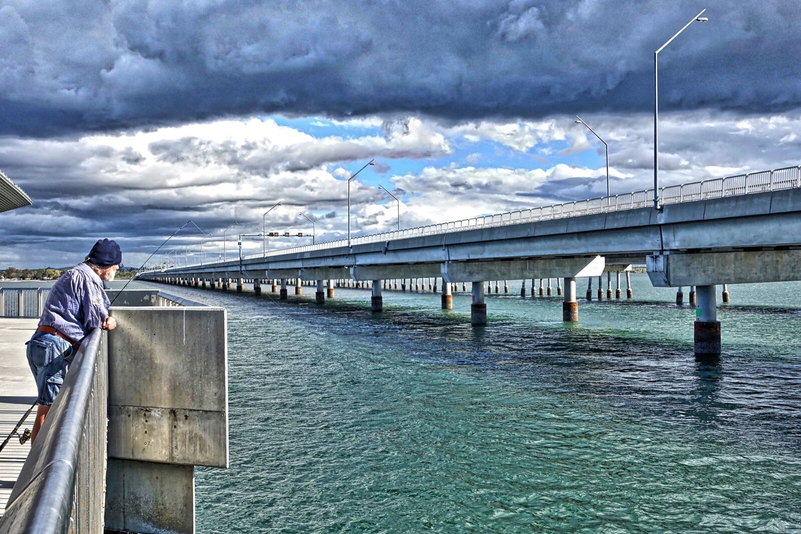 Sony Cyber-shot DSC-RX100 III sample photo. Fisherman, bridge, perspective photography