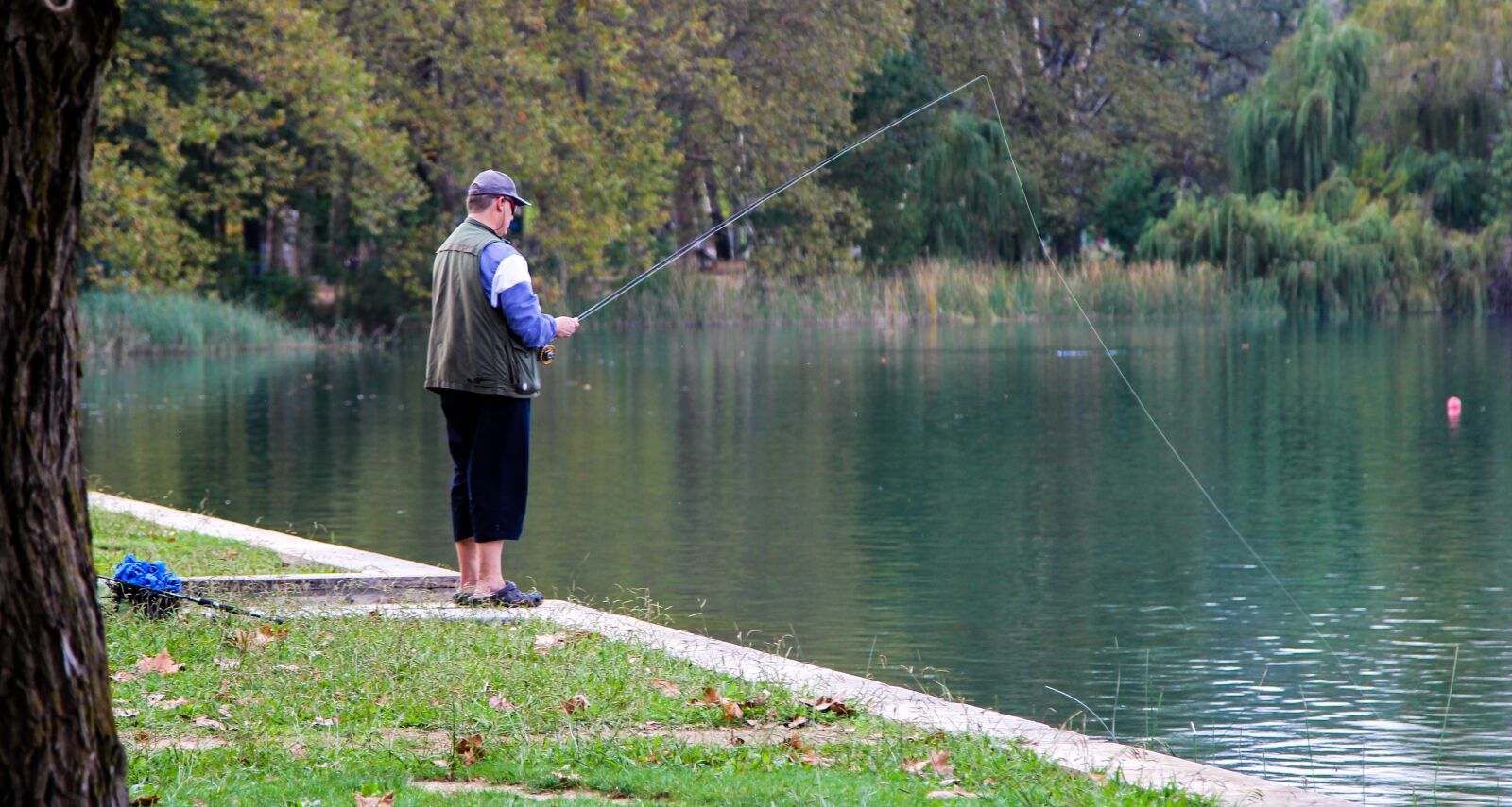 Canon EOS 60D + Canon EF 24-105mm F4L IS USM sample photo. Fisherman, lake, water photography