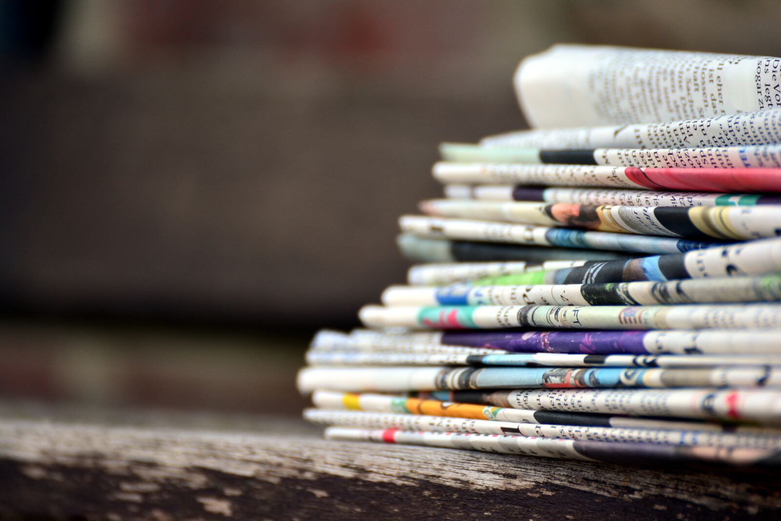 Nikon D5200 sample photo. Newspapers, paper stack, press photography