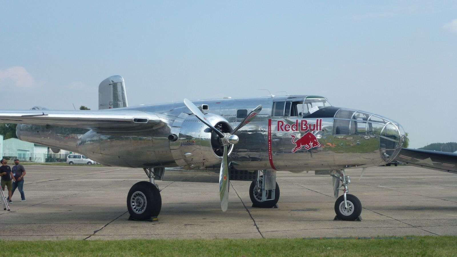 Panasonic Lumix DMC-ZS10 (Lumix DMC-TZ20 / Lumix DMC-TZ22) sample photo. Silver, wing, aircraft photography