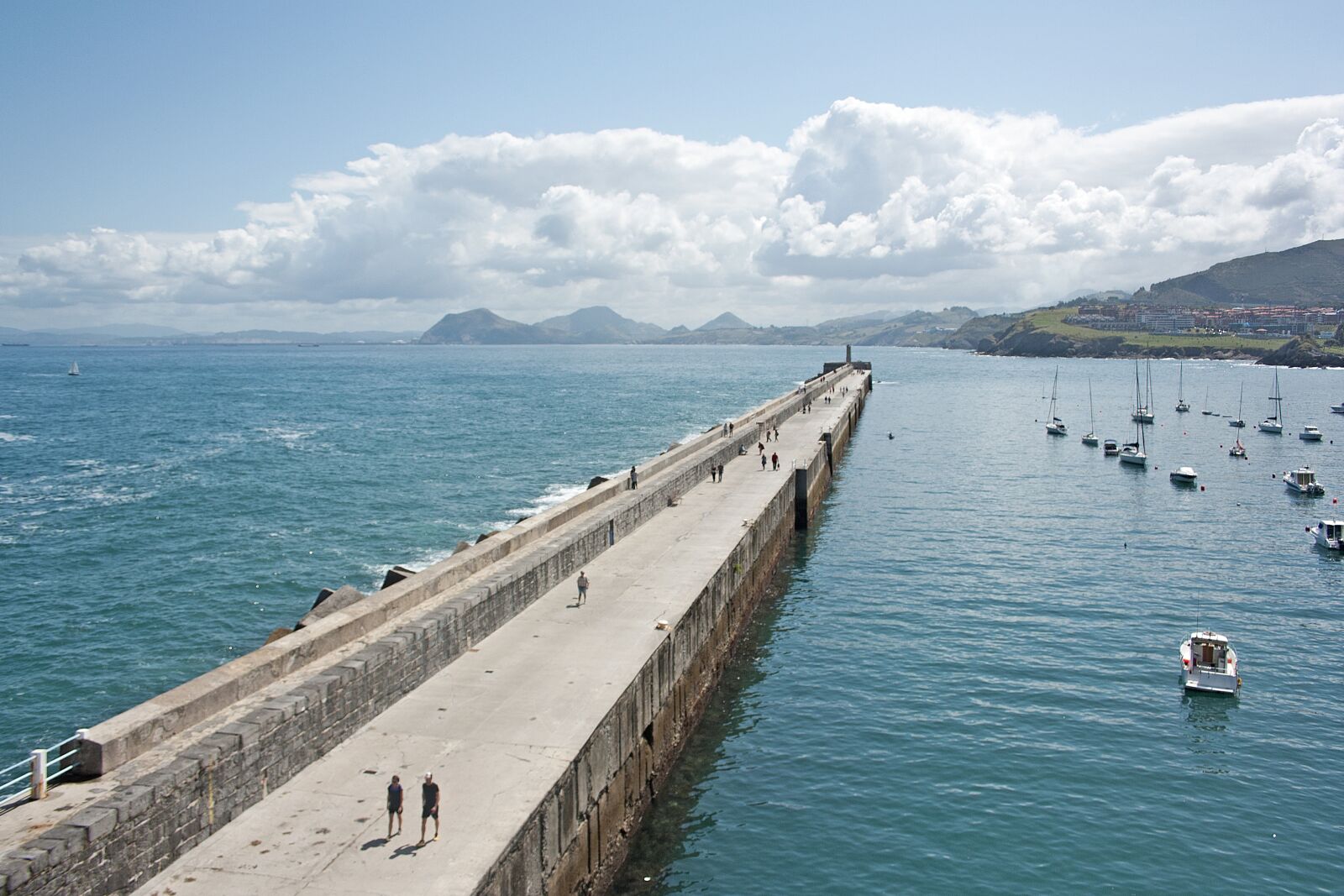 Canon EF-S 18-55mm F3.5-5.6 II sample photo. Breakwater, beach, sun photography