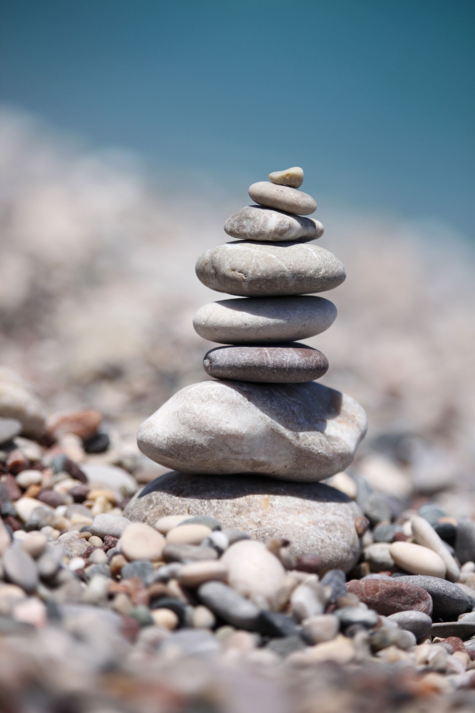 Canon EOS 500D (EOS Rebel T1i / EOS Kiss X3) sample photo. Balancing, stones, beach photography