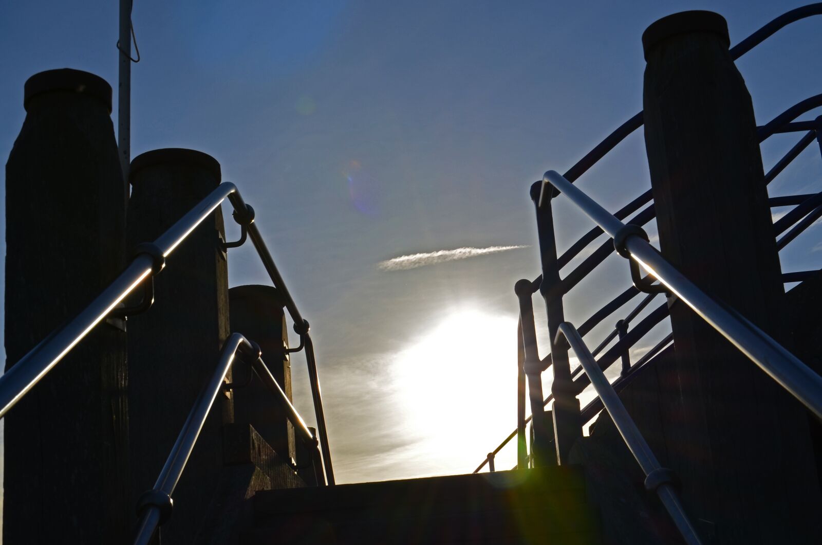 Nikon D5100 sample photo. Steps, sunlight, rails photography