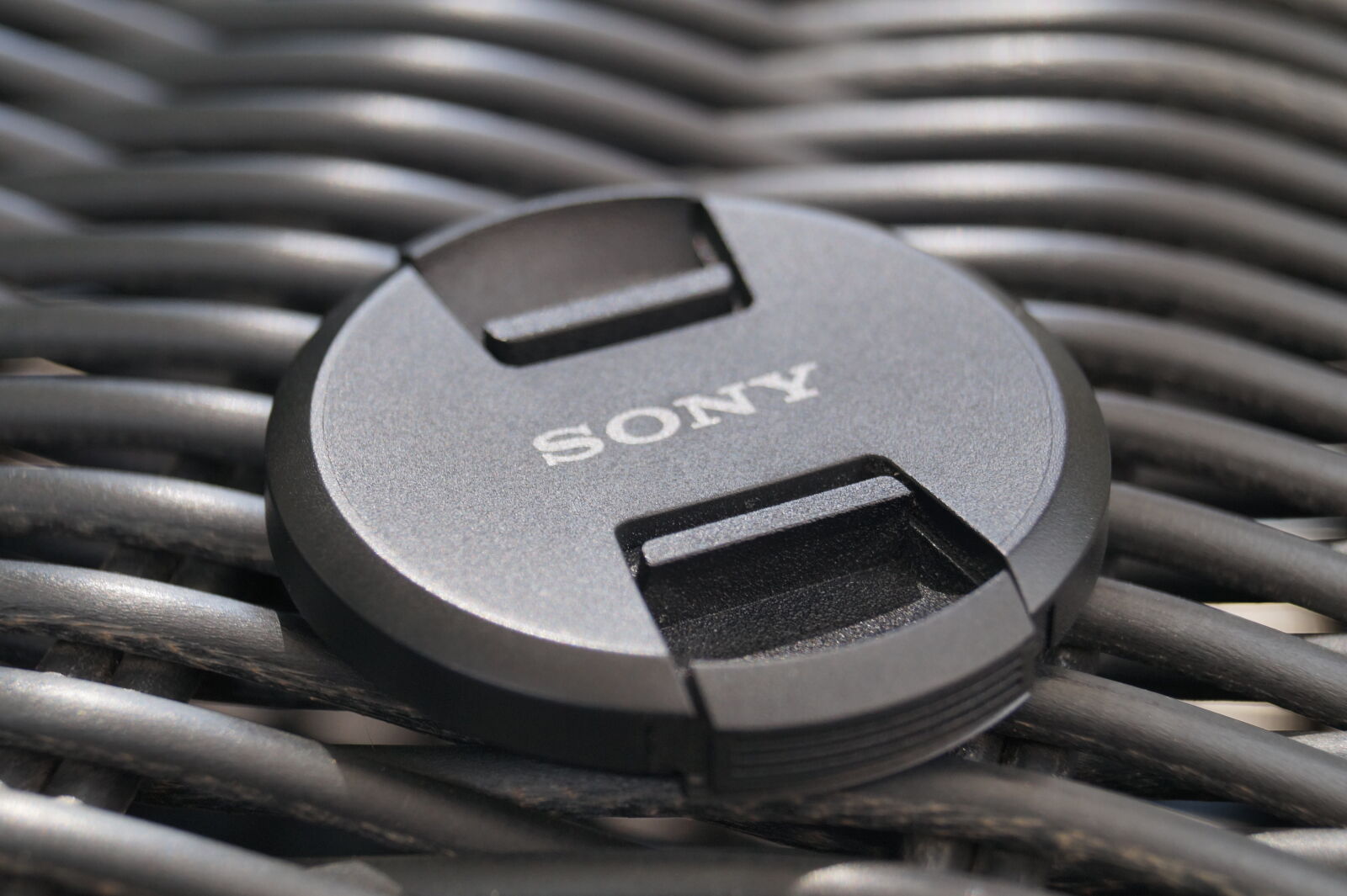 Sony SLT-A58 sample photo. Camera, lens, cap, lens photography