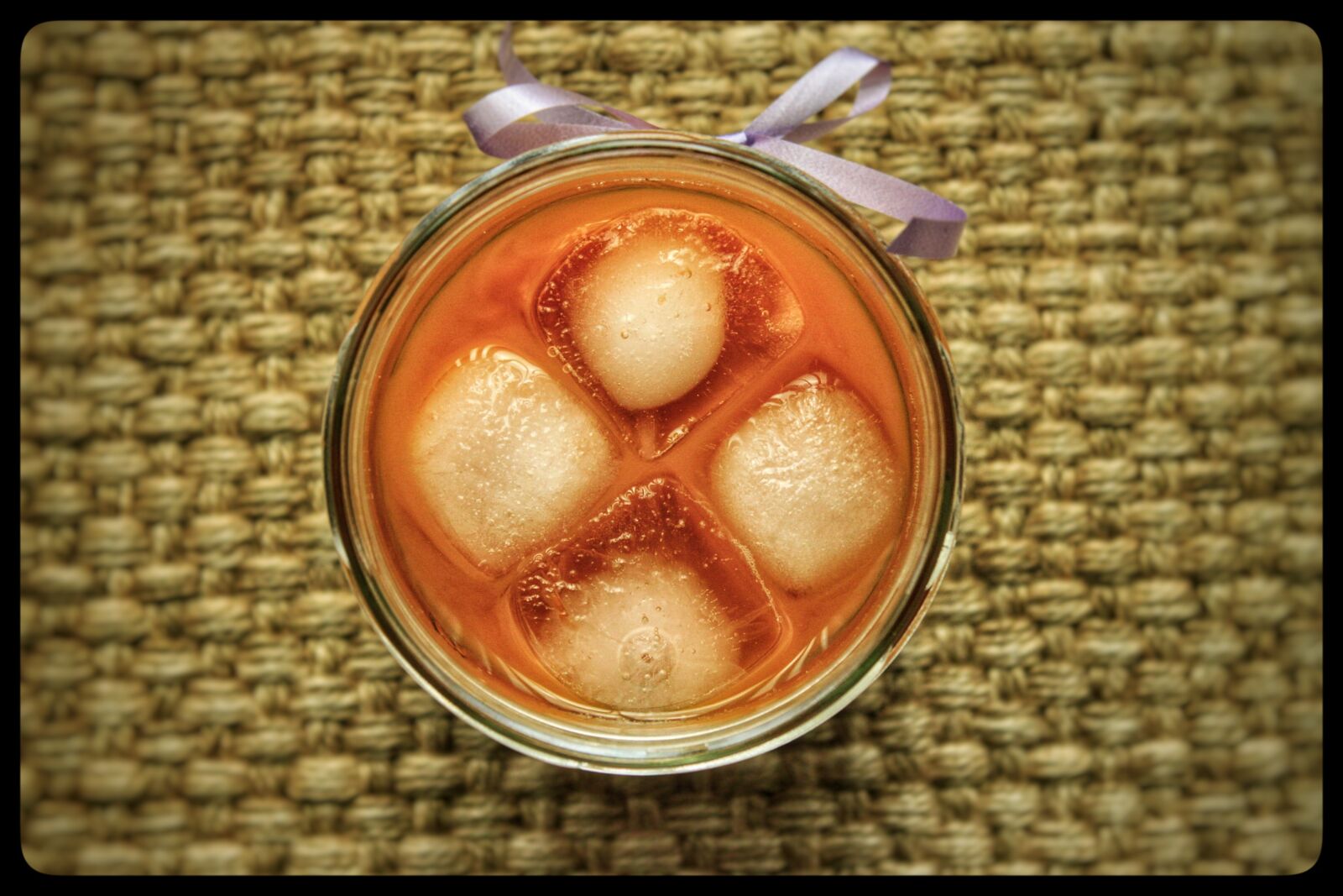 Canon EOS 500D (EOS Rebel T1i / EOS Kiss X3) sample photo. Icecubes, orange, juice photography