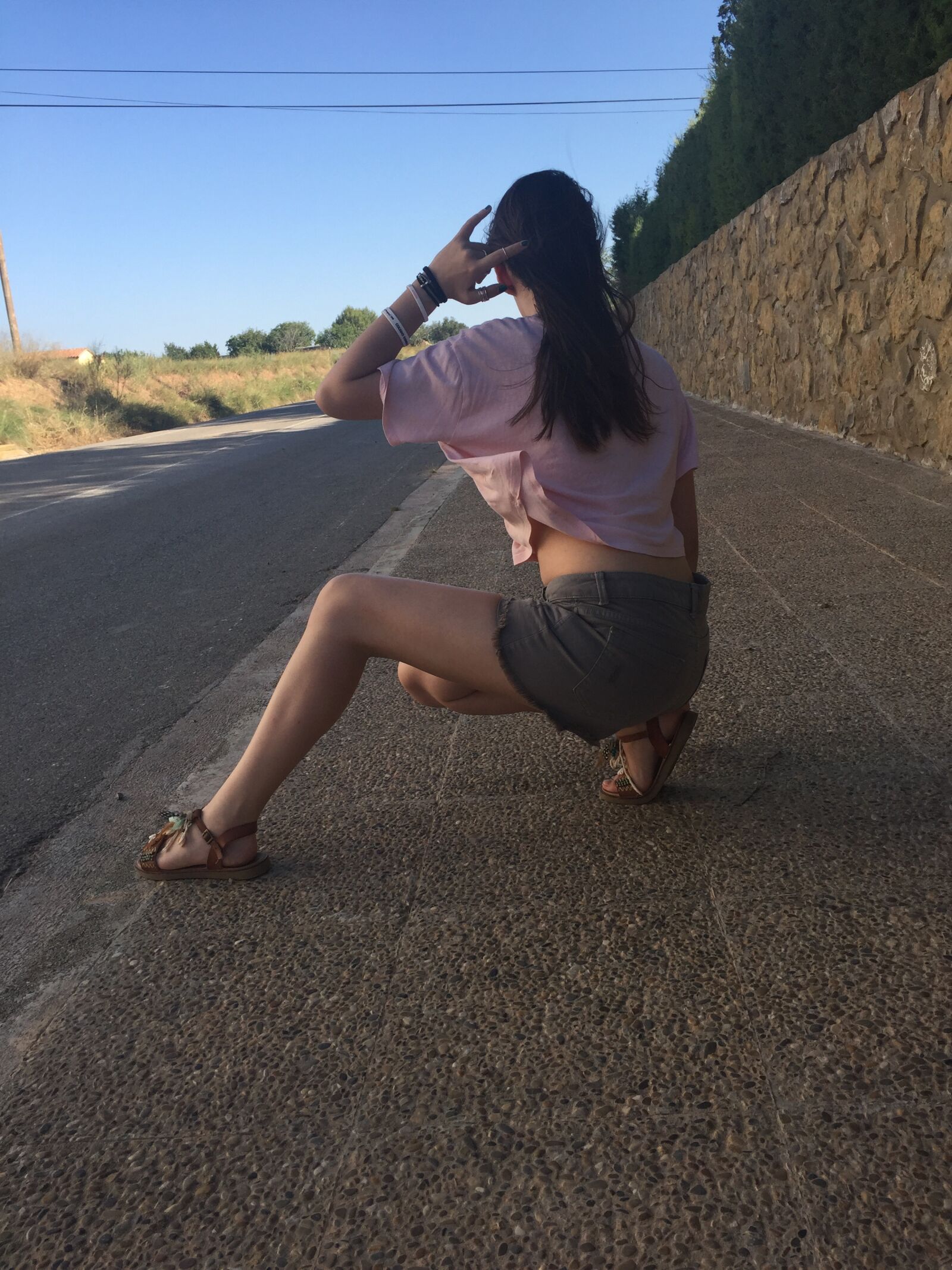 iPhone 6 back camera 4.15mm f/2.2 sample photo. Person, road, wall photography