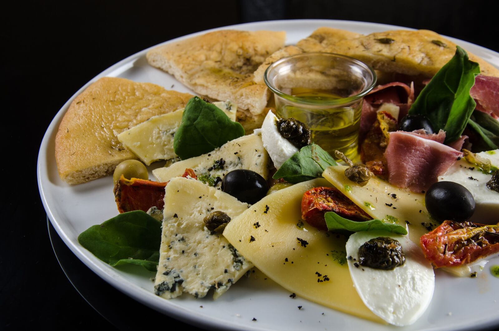 Nikon D7000 sample photo. Foccacia with olives, tasting photography