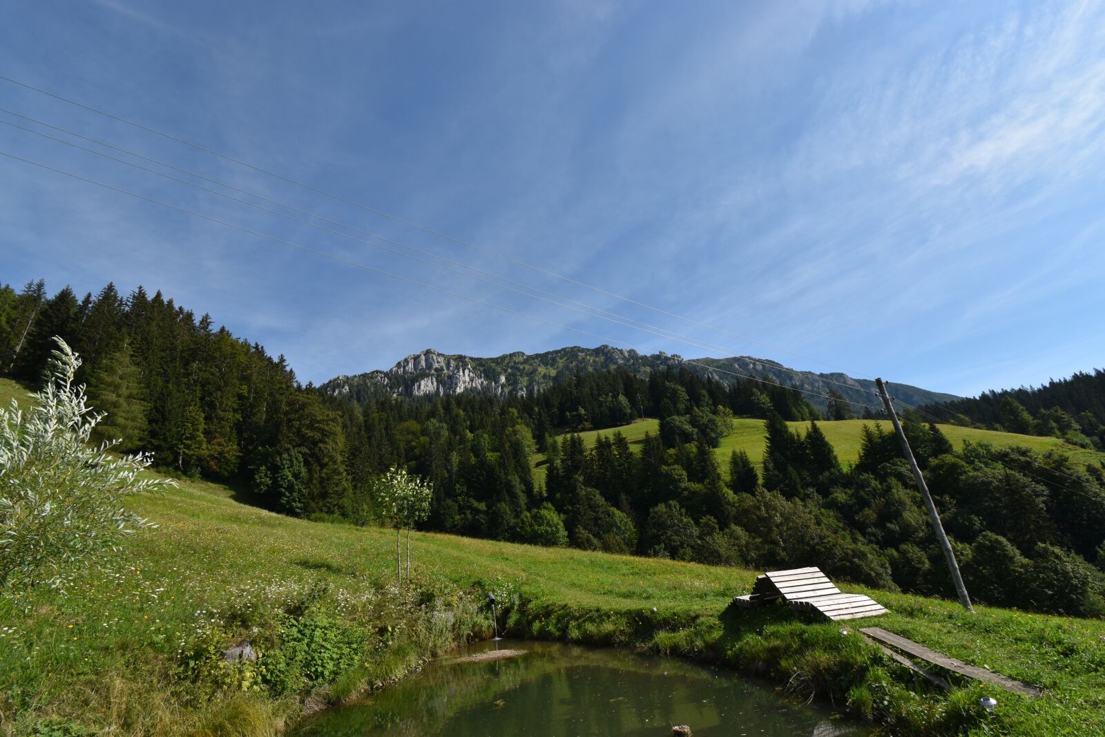 Nikon D5600 sample photo. Hill, deck chair, mountain photography