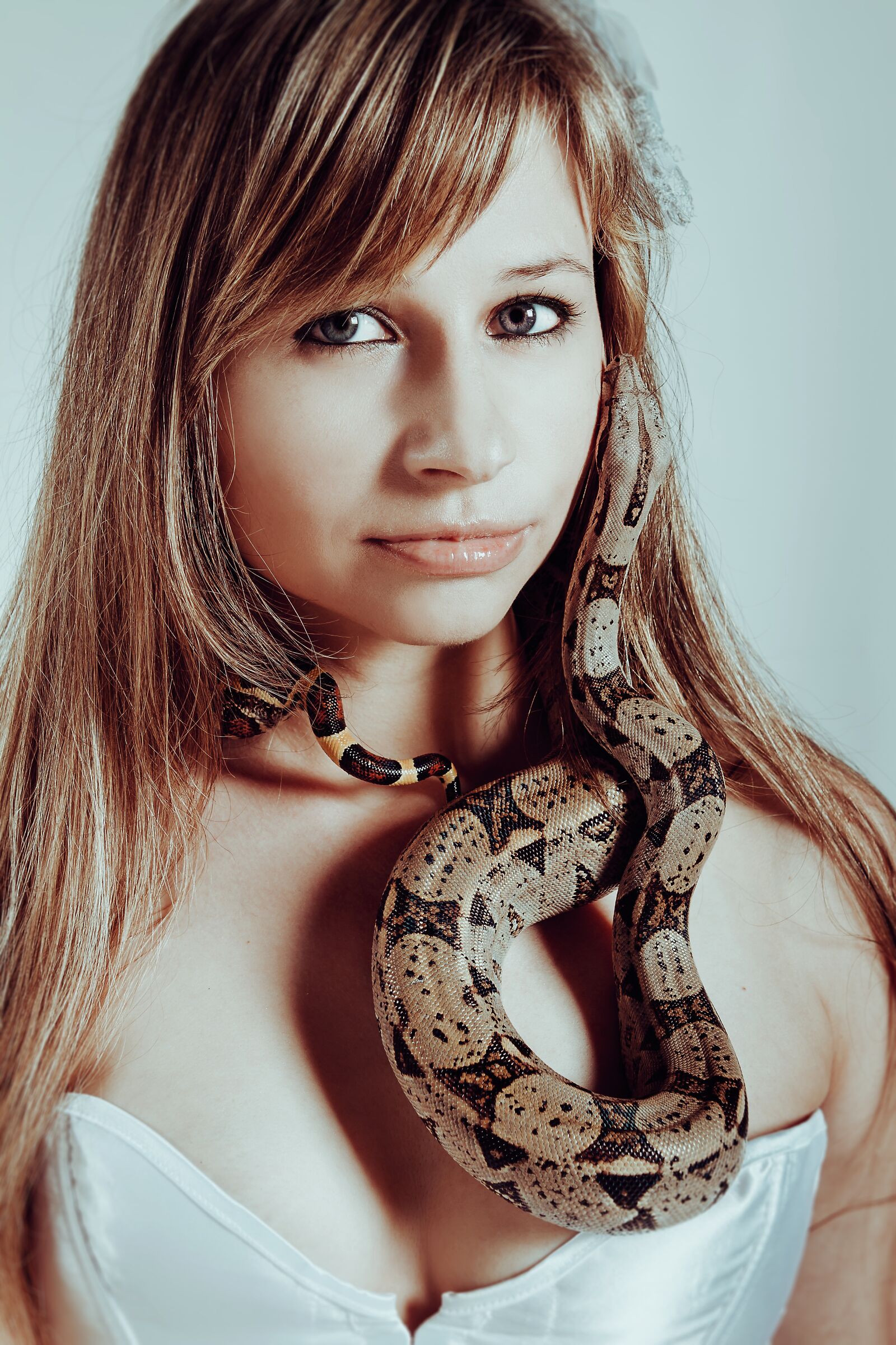 Canon EOS 7D + Canon EF 24-70mm F2.8L USM sample photo. With a snake, boa photography