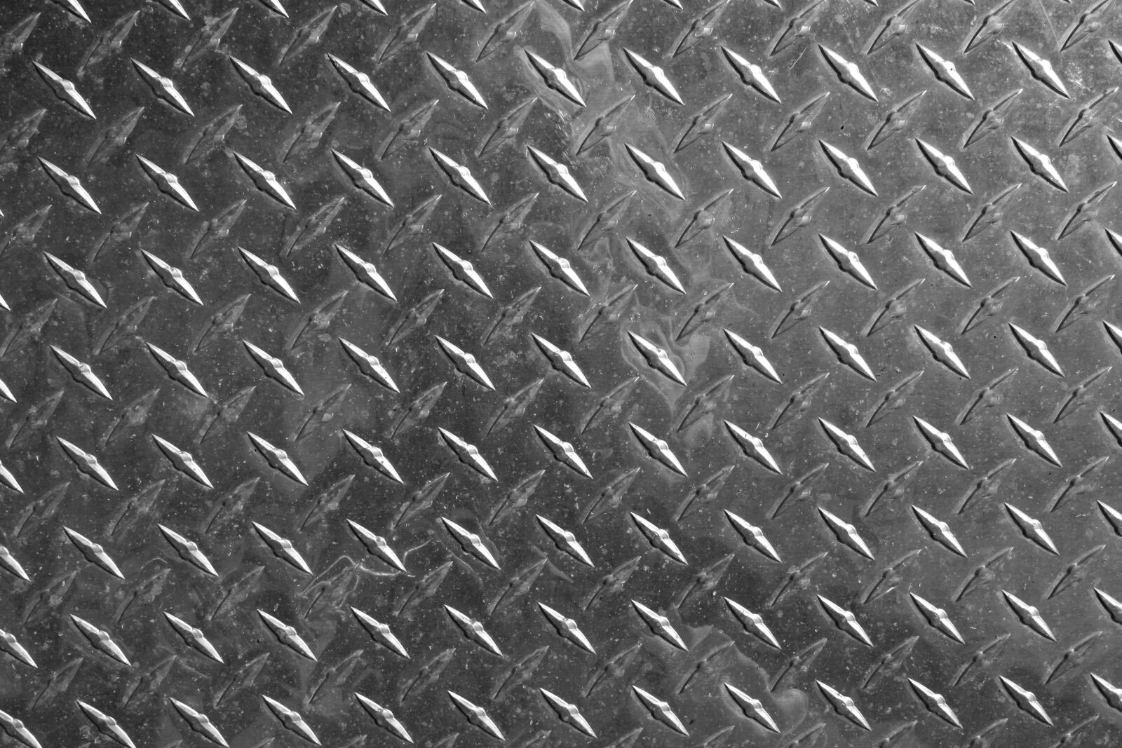 Canon EOS 1000D (EOS Digital Rebel XS / EOS Kiss F) + f/3.5-5.6 IS sample photo. Aluminium, gray, textured metal photography