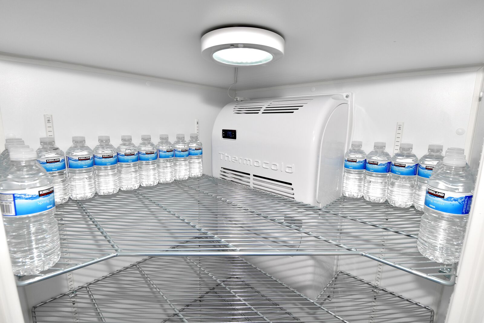 Nikon D5500 sample photo. Water bottle, empty fridge photography