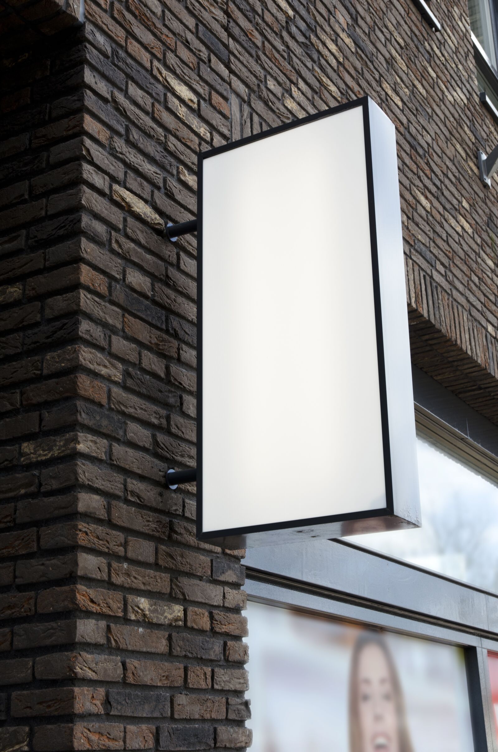 Nikon D5100 sample photo. Sign, window, wall photography