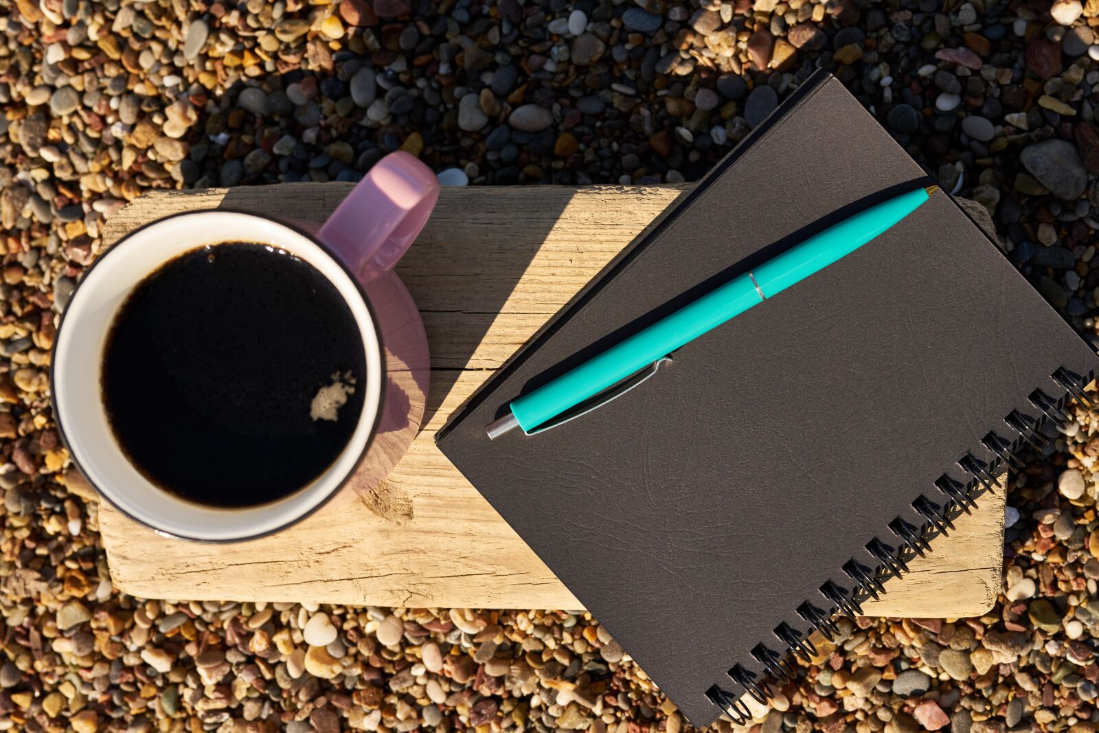 Sigma 85mm F1.4 DG HSM Art sample photo. Coffee, pen, notebook photography