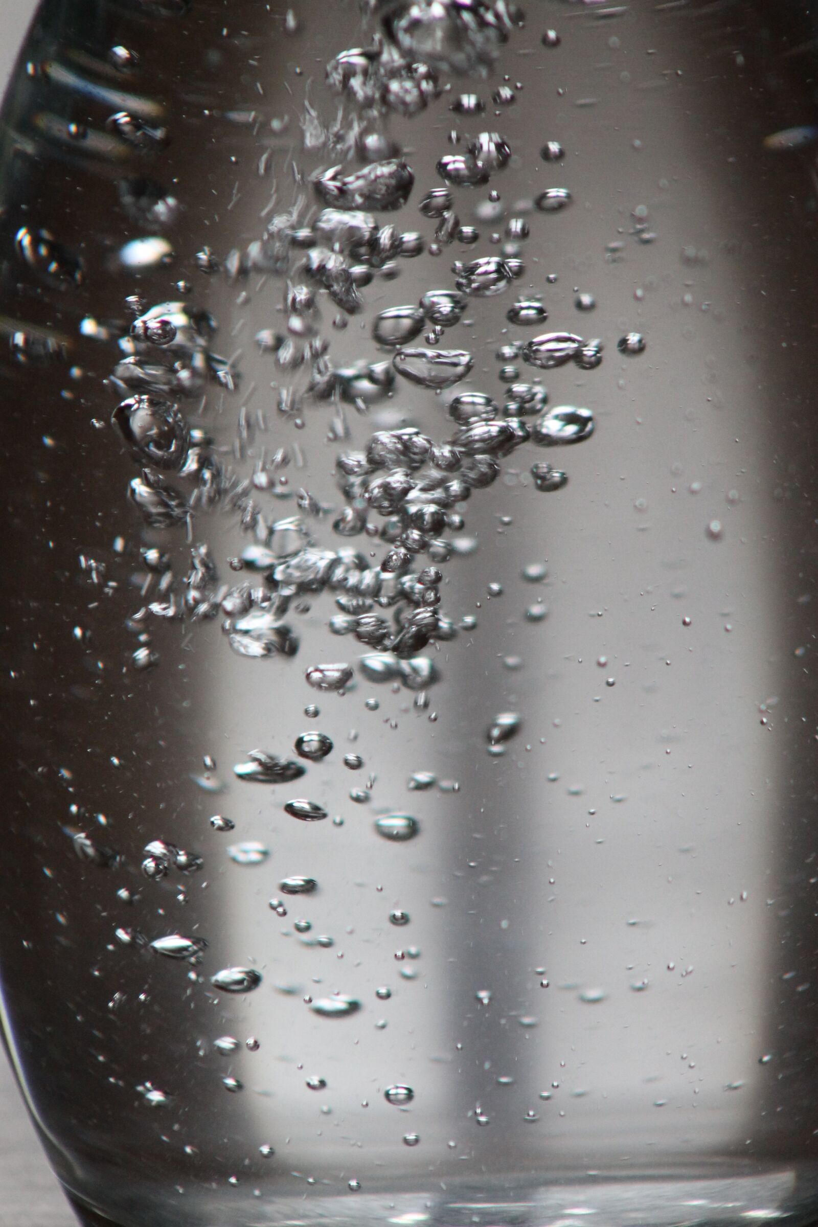 Canon EF 75-300mm f/4-5.6 sample photo. Glass, water, spray photography