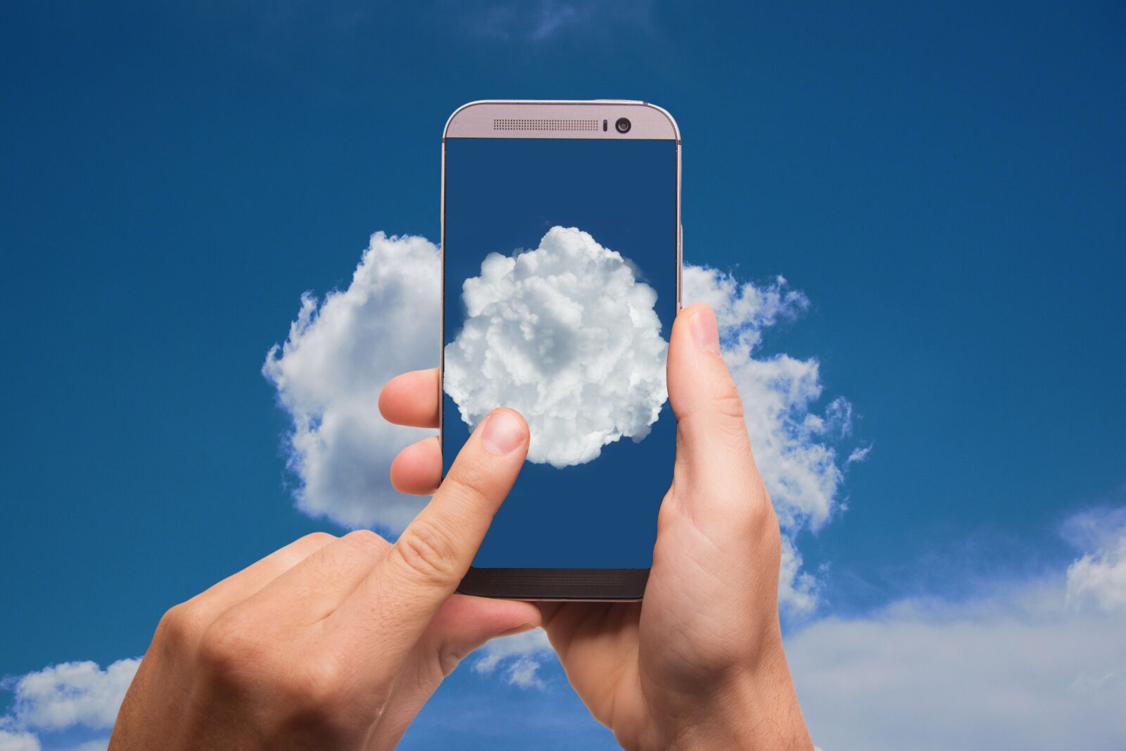 Canon EF-S 18-135mm F3.5-5.6 IS sample photo. Cloud, finger, smartphone photography
