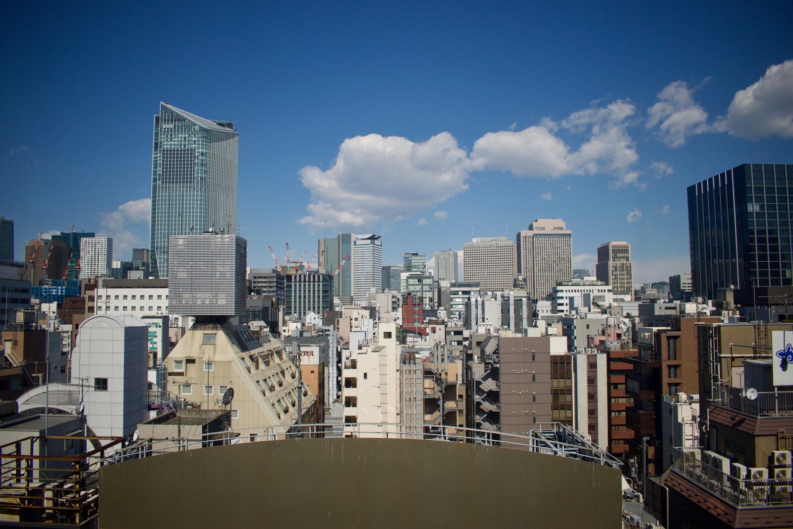 Nikon D5300 sample photo. Clouds, japan, skyscrapers photography