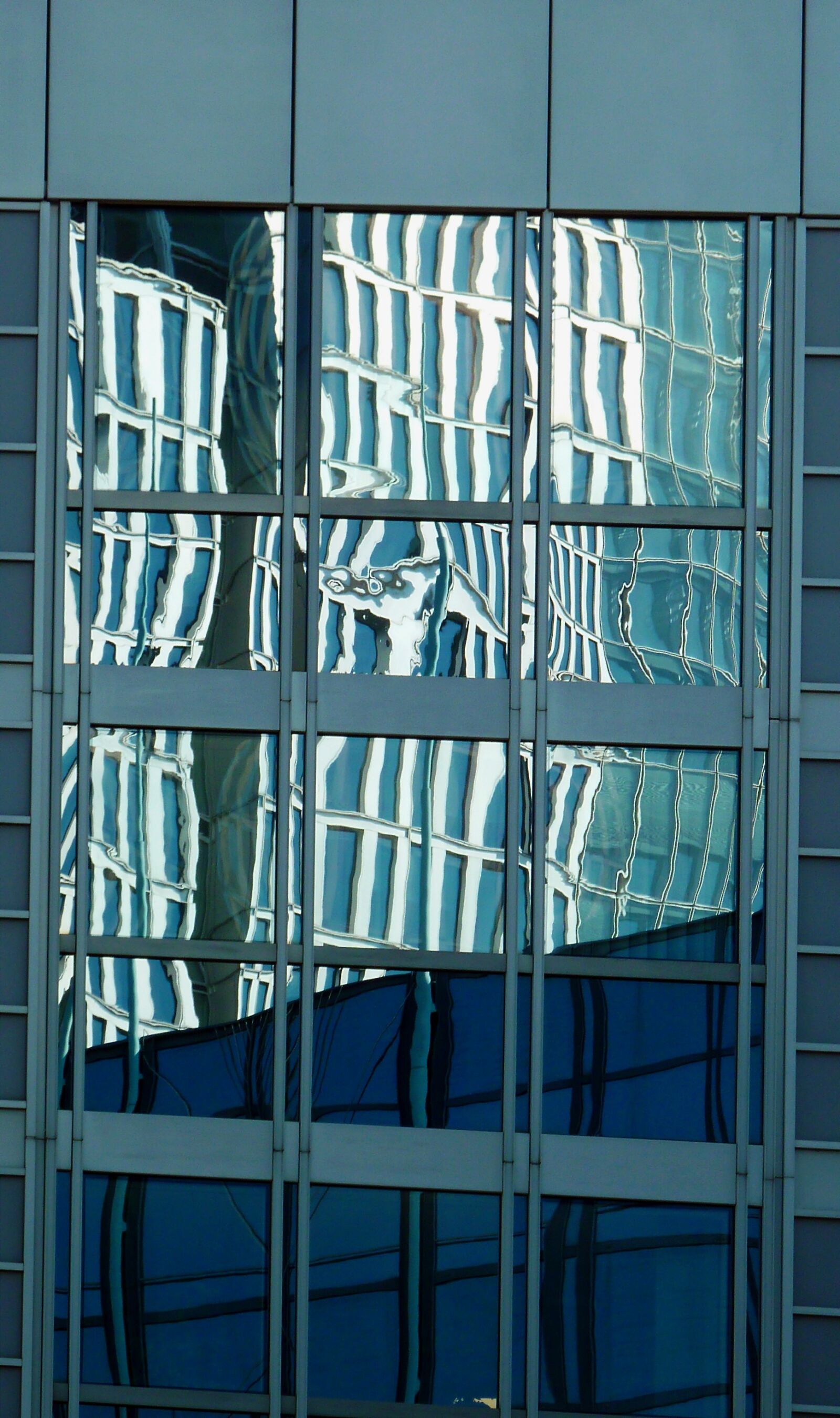 Panasonic DMC-TZ7 sample photo. Facade, glass, flawlessness photography