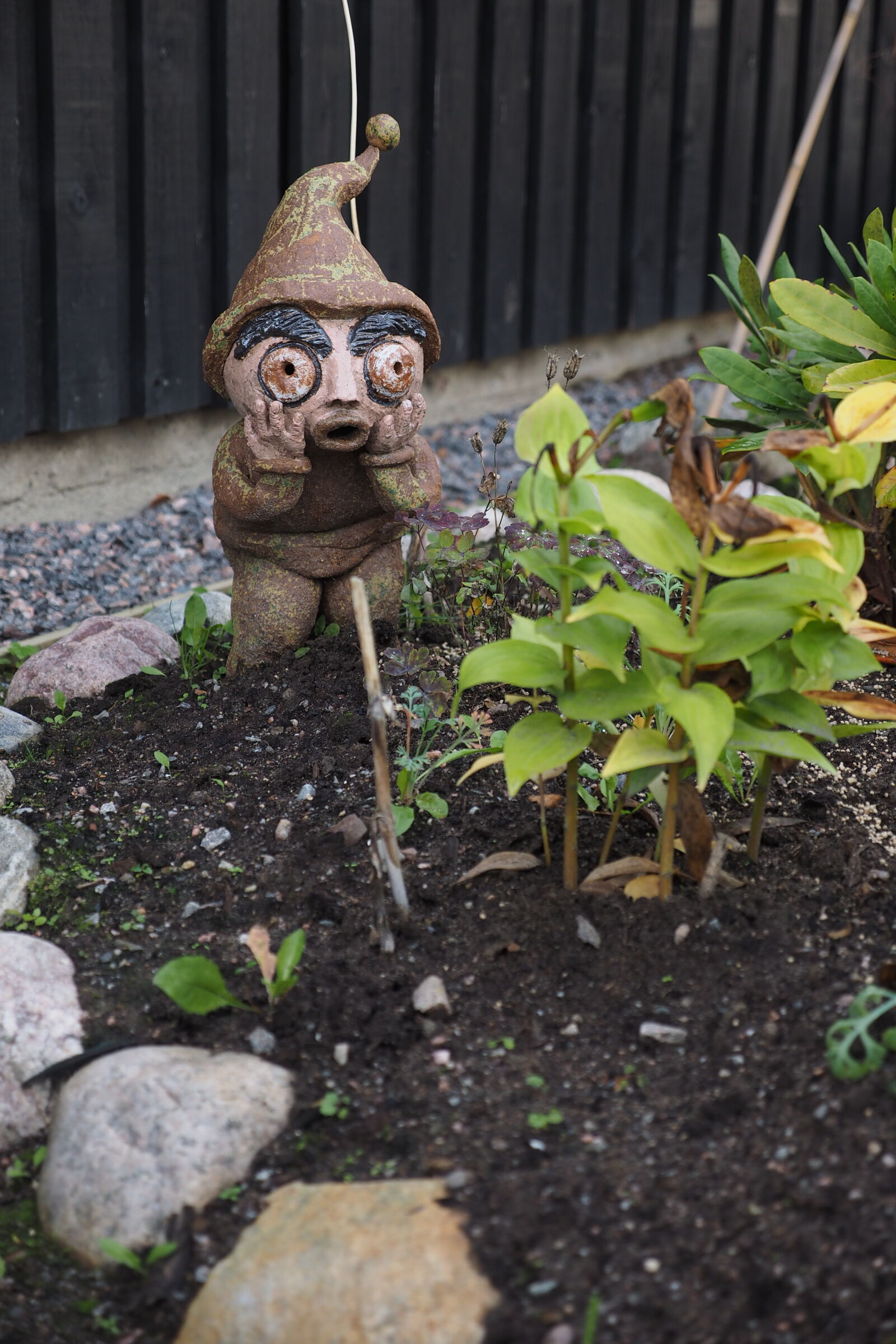 Olympus OM-D E-M1 sample photo. Embarrassed garden gnome photography