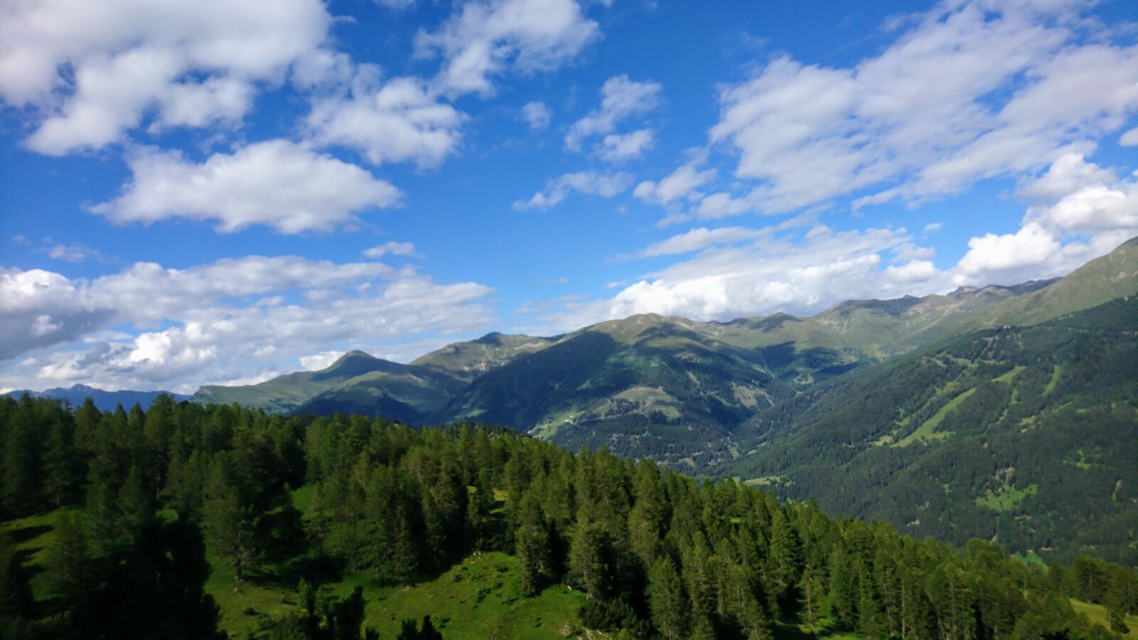 Sony F5321 sample photo. Clouds, sky, mountains photography