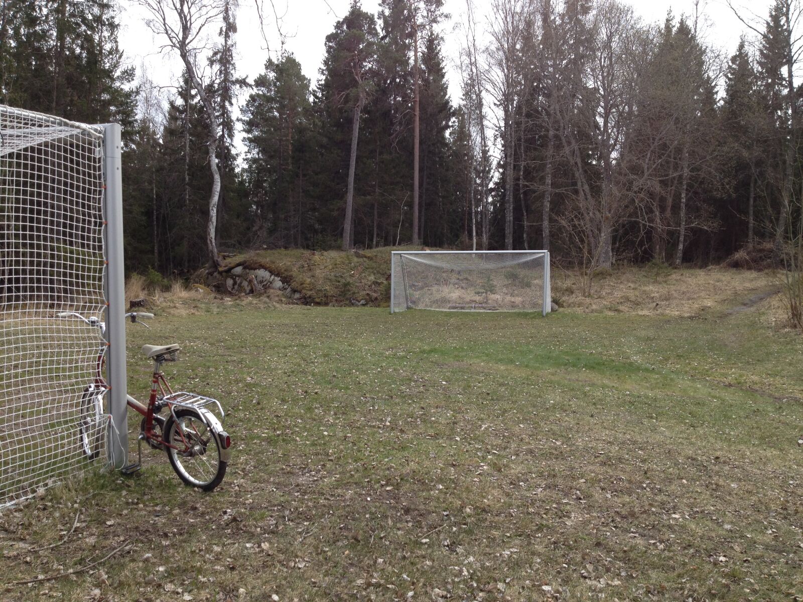 iPhone 4S back camera 4.28mm f/2.4 sample photo. Bicycle, football, field, goal photography
