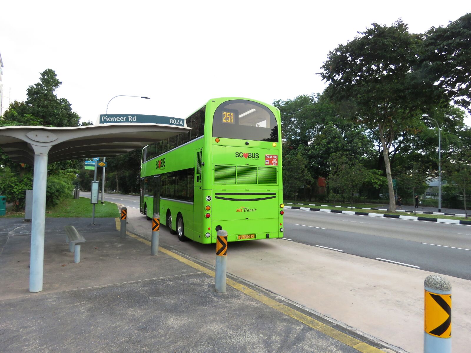 Canon PowerShot SX60 HS sample photo. Bus, bus stop, singapore photography