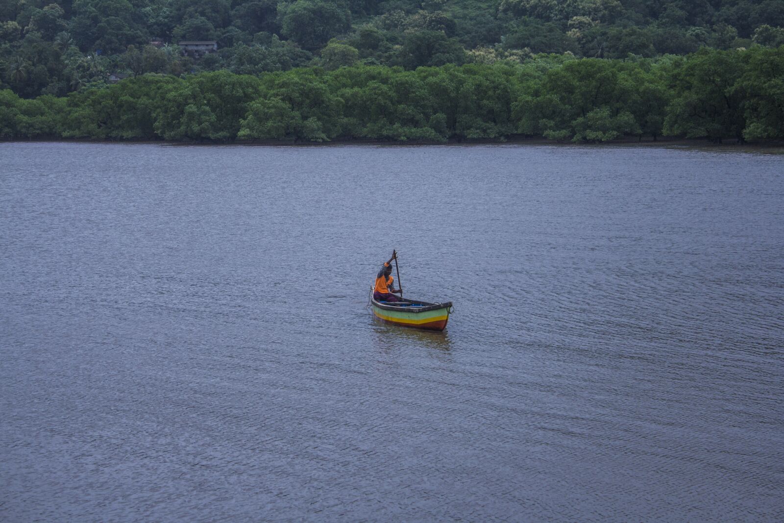 Canon EF-S 18-55mm F3.5-5.6 IS sample photo. Fisherman, boat, water photography